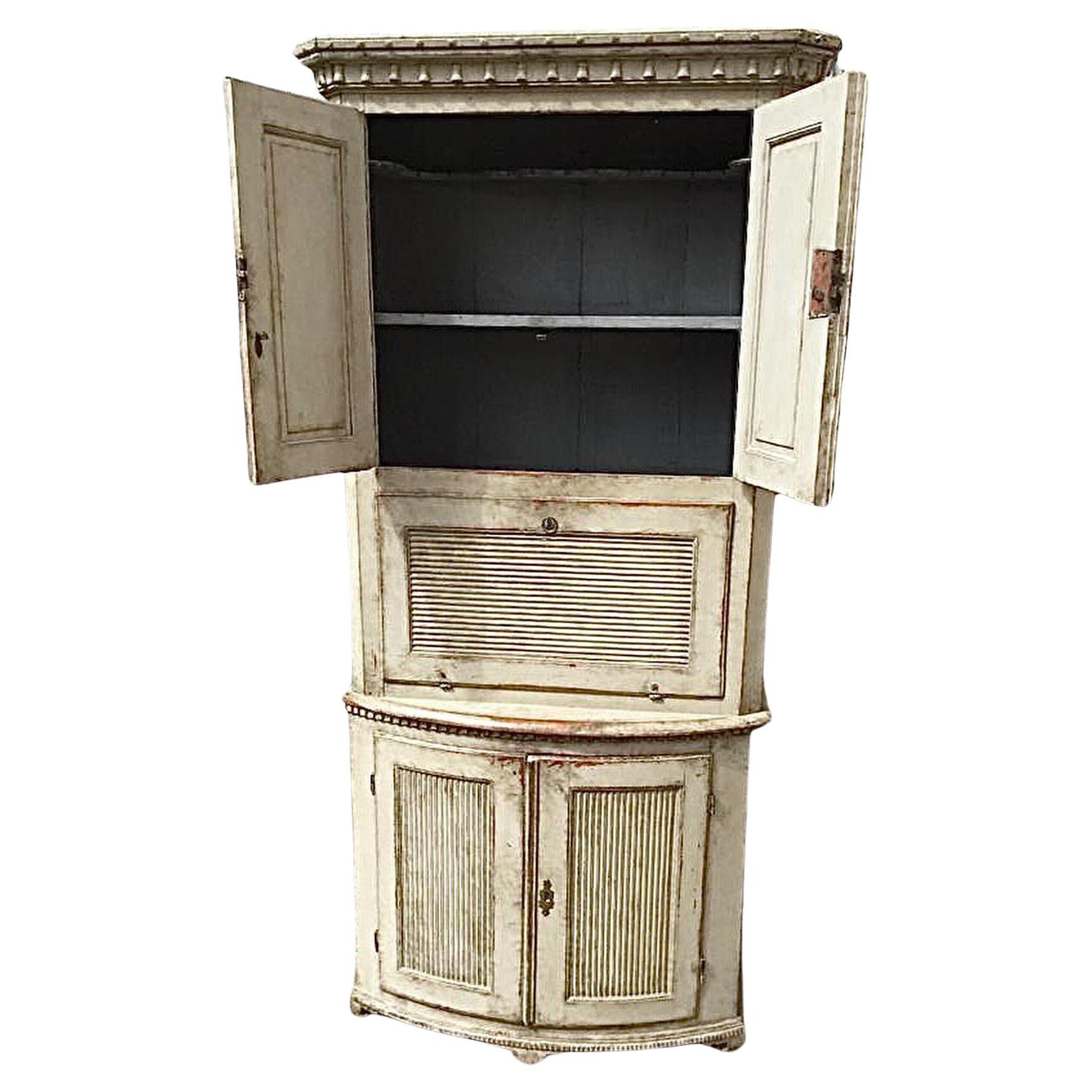 A unique and one of a kind 19th century Gustavian Swedish bar cabinet. This can be used for many things and can also function as a serving area. Paint and repairs may have been touched up over the years with previous owners. This piece breaks down