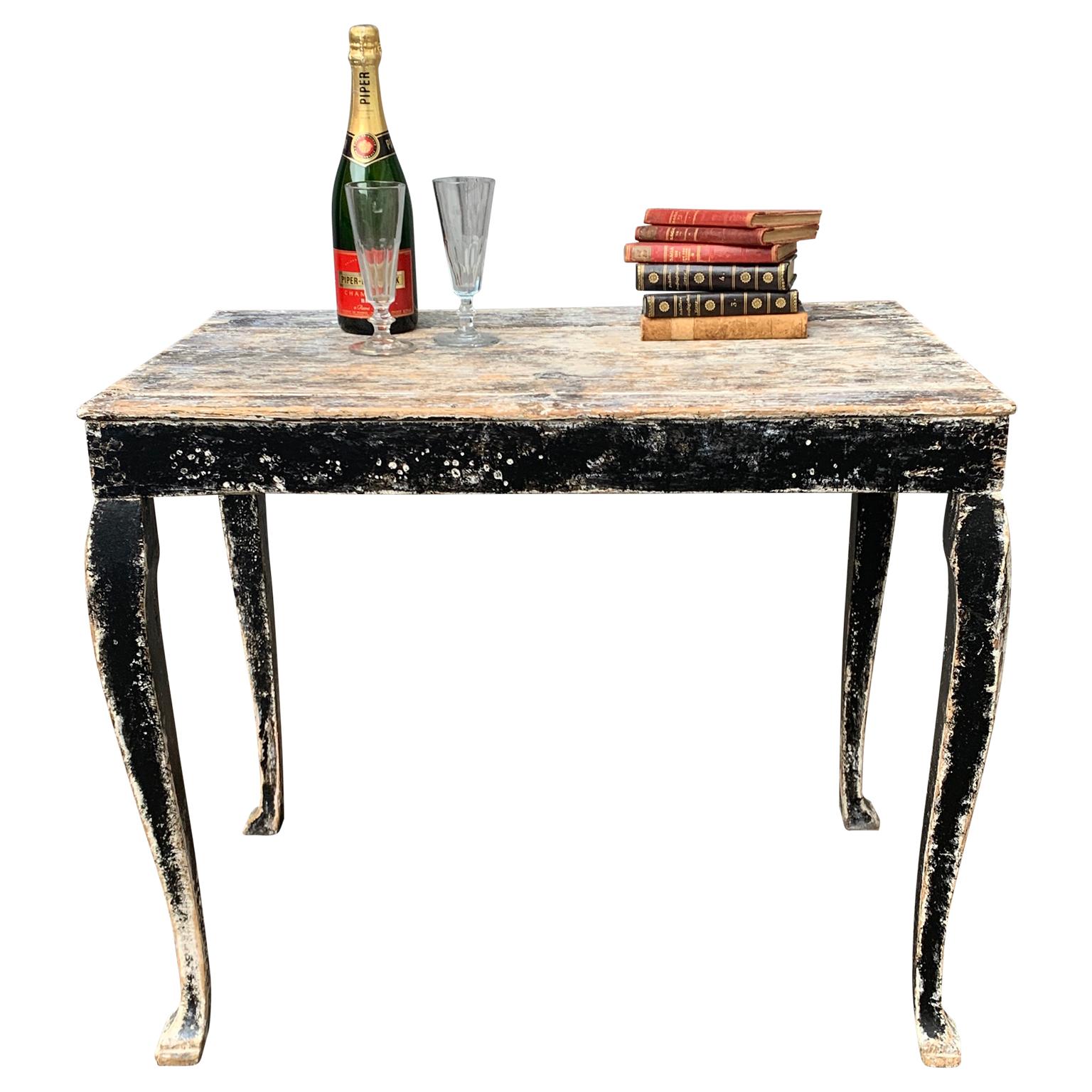A black painted Gustavian early 19th Century Console table. This pine Swedish free-standing console table is from around 1800-1820. It can stand freely in a room since there is not front or back and can be used as a cocktail table, a nightstand or a