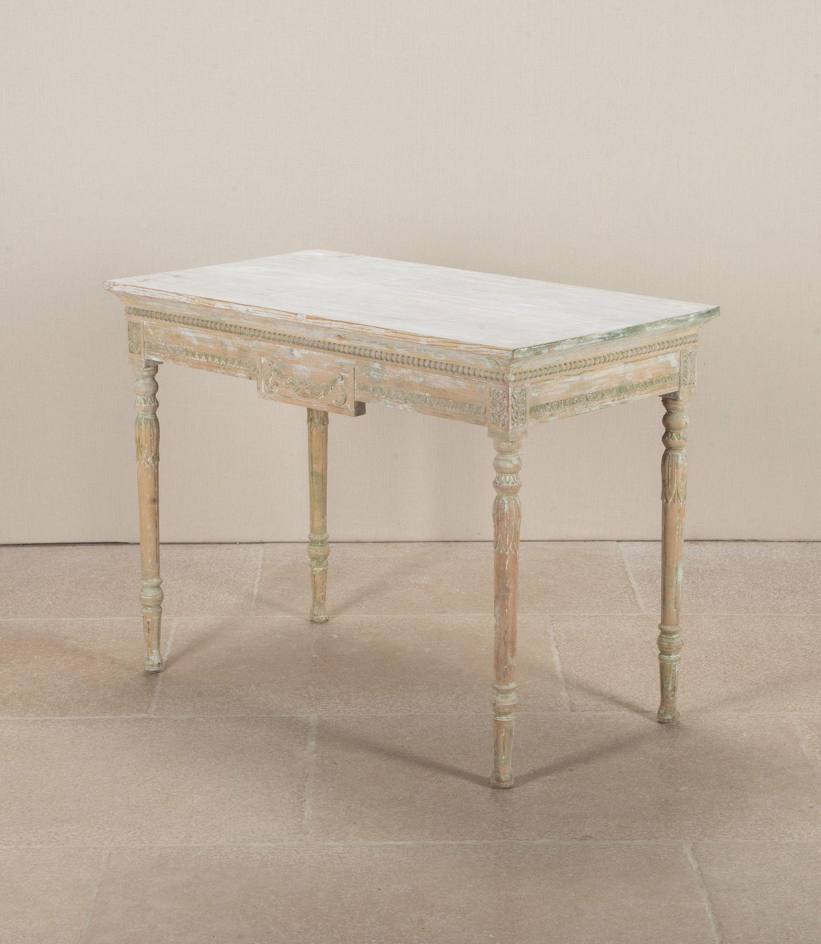 Charming early 19th Century Swedish Gustavian period console table.

In original paint with carved detail to all four sides. This table has multiple uses.

Circa 1800. With restoration.
