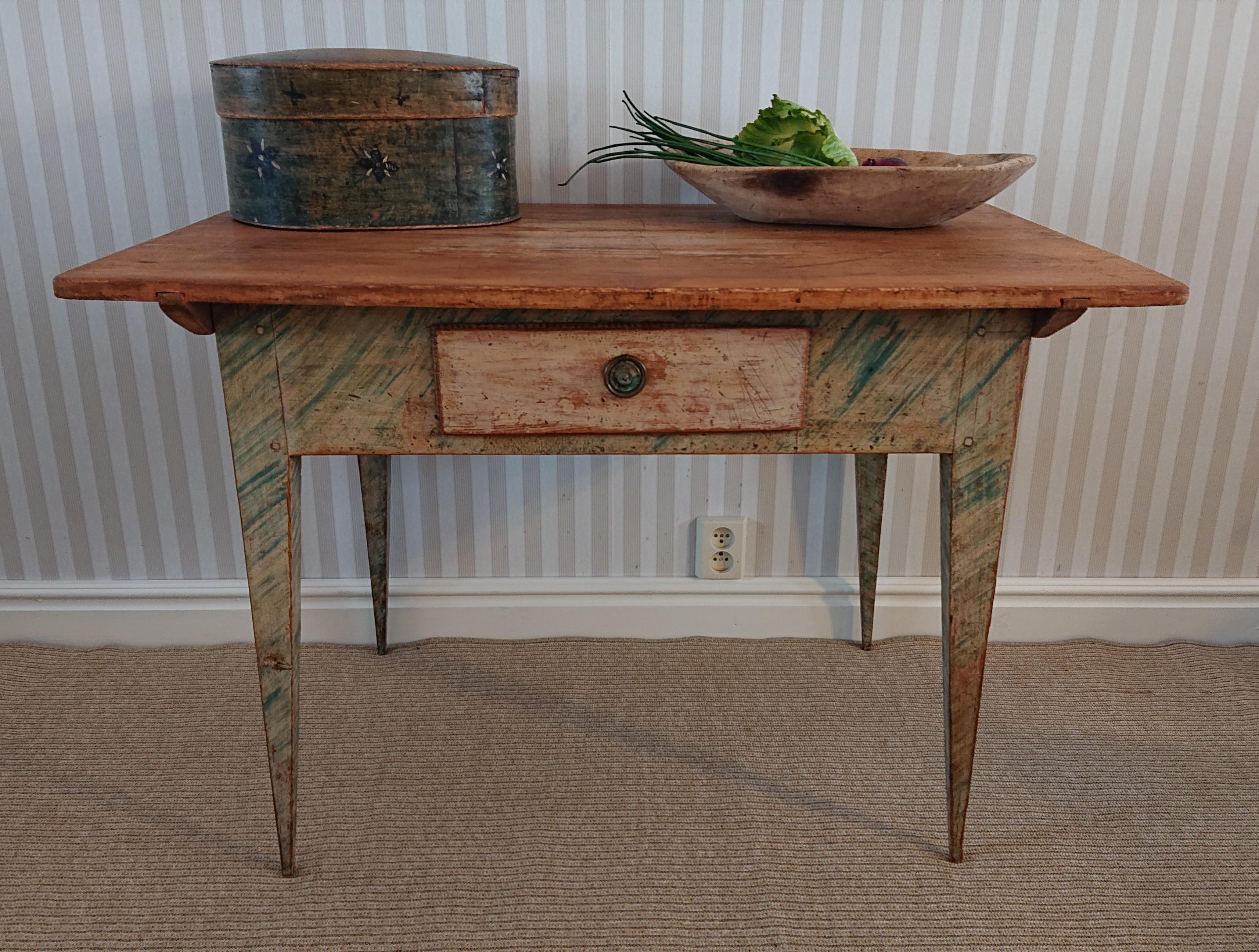 19th century Swedish Gustavian desk from Sundsvall Medelpad, Northern Sweden.
A stunning desk with fantastic patina.
Scraped and washed to its well Preserved Originalpaint.
Lovely marble imitations paint
Nicely tapered legs and one drawer.
The