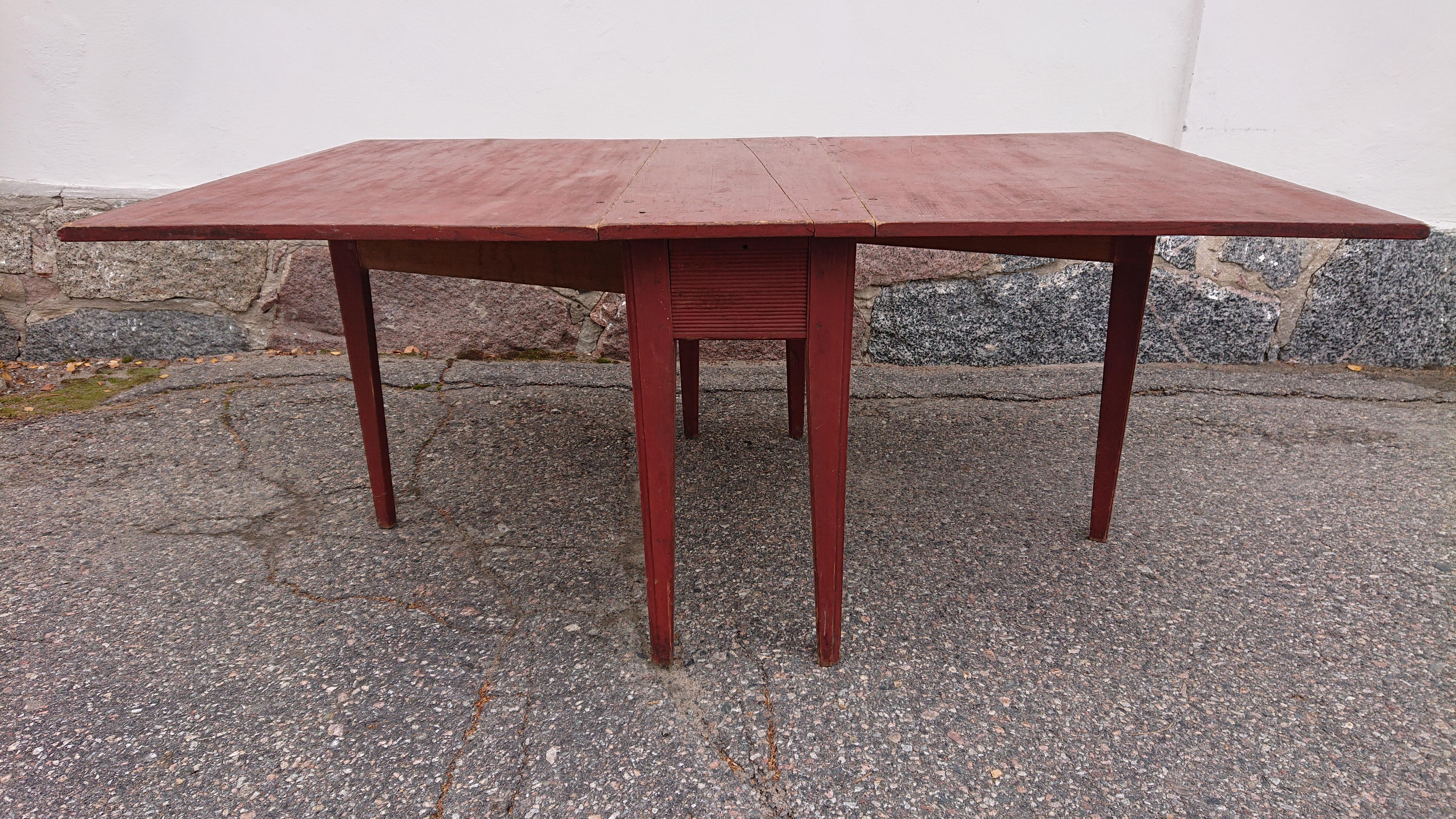 19th Century Swedish drop leaf table from Skelleftea Vasterbotten, Northern Sweden.

Measurements H. 77cm W. 181cm D. 114cm
The measurements shown in the listing is when the Drop Leaf are folded down for an accurate shipping quote.

This