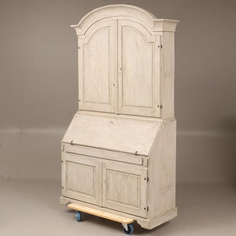 Faux Marble Painted Swedish Gustavian Secrétaire. What a beautiful piece for just about any room! The top cabinet opens up with shelves allowing for storage and showcasing. The door drops open for use as a writing desk that is help up by support