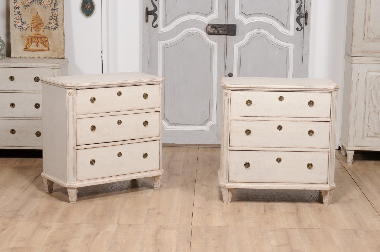 Carved 19th Century Swedish Gustavian Style Painted Three-Drawer Chests, a Pair For Sale