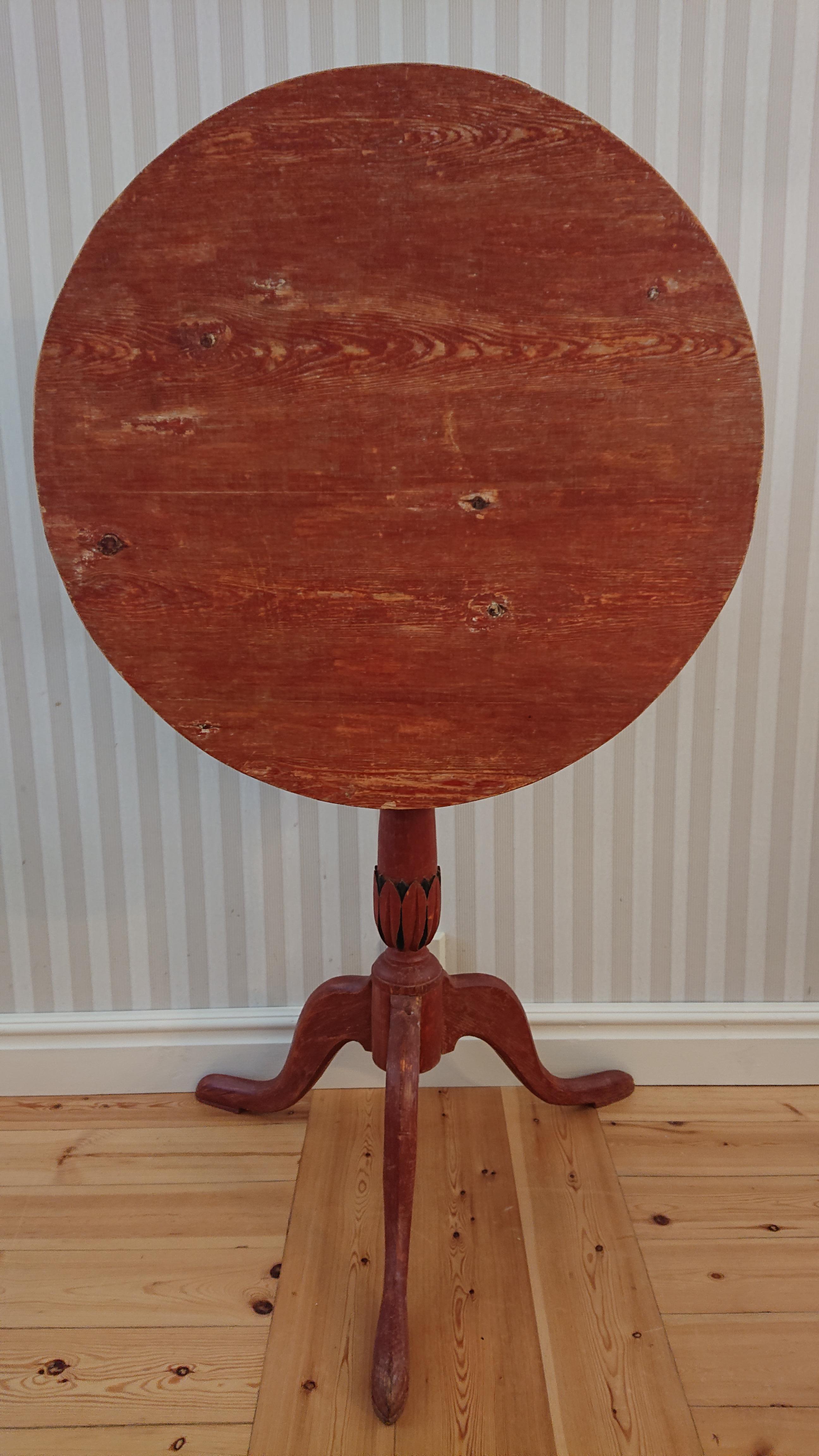 19th Century Swedish Gustavian Tilt Top Table from Umea Vasterbotten, Northern Sweden. 
A nice Tilt Top Table with a beautiful hand carved foot in the shape of leaf.
Very useful & easy to place. 
Nice as a coffetable for the armchair or standing
