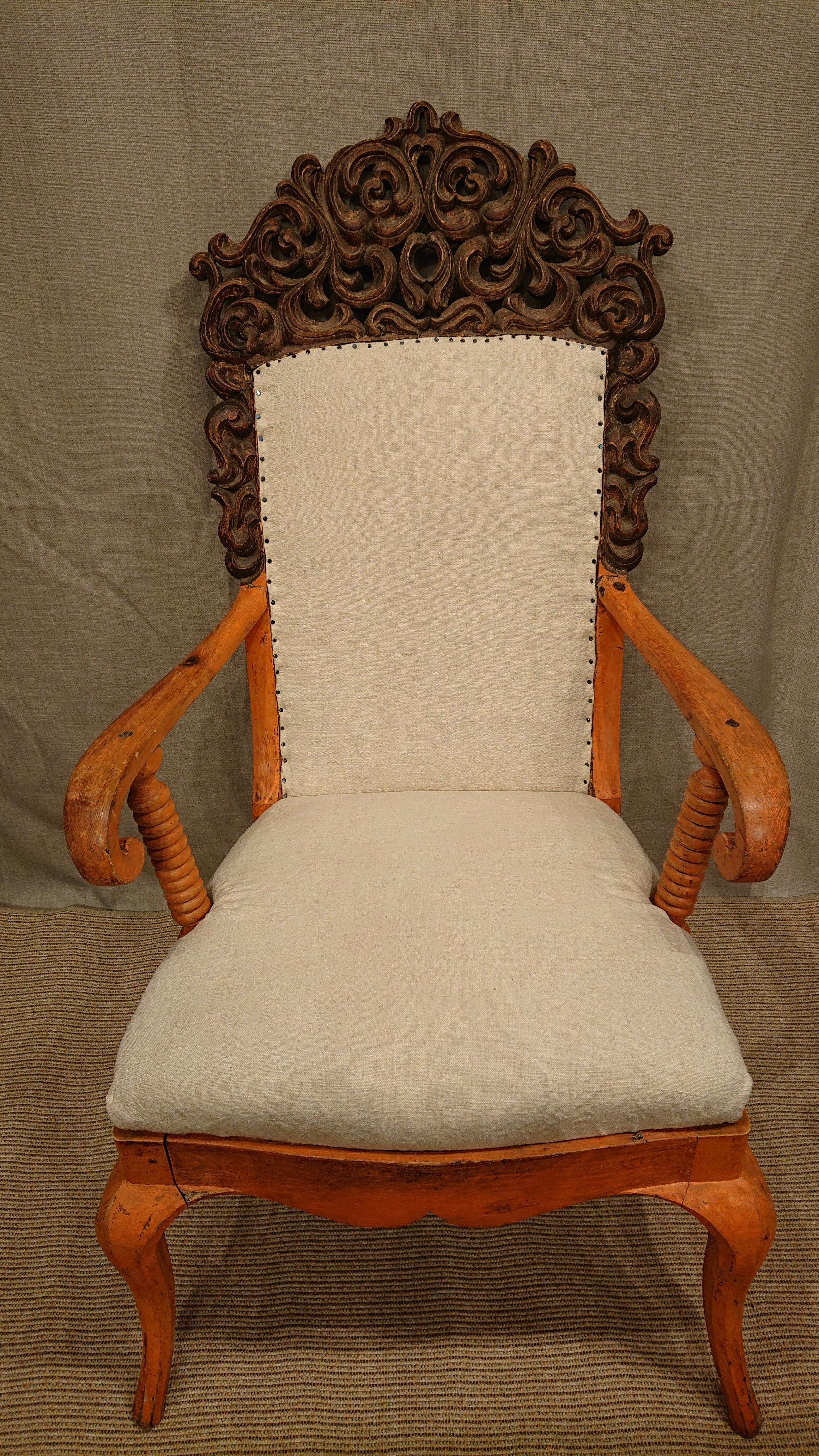 19th century Swedish late Baroque style arm-chair from Skelleftea Vasterbotten, Northern Sweden.
Charming unusually armchair with fantastic hand-carved upper part & colorful color.
Nicely curved legs & turned pillars that hold up the armrest.
