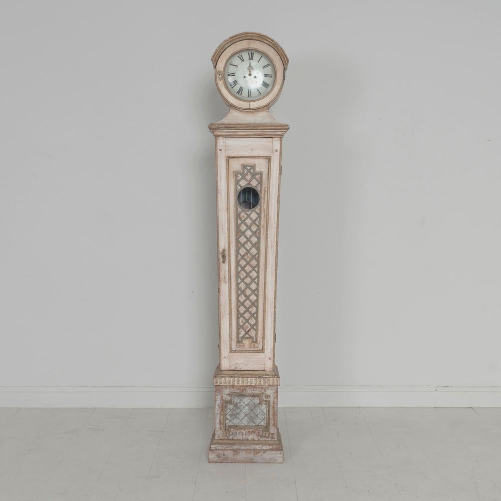 This is a rare Swedish Mora clock with exceptional crosshatch detail in the neoclassical style, circa 1810. Original face, clockworks, pendulum and weights. This clock has been cleaned and serviced and is operating with its original works.

We offer