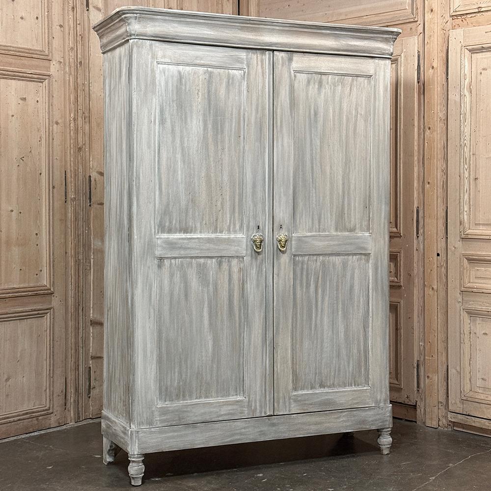 19th Century Swedish Neoclassical Whitewashed Pine Armoire will command a stately presence in the room, but with a subtle elegance that enables it to blend with a wide variety of decors with varying degrees of casual themes.  The crown molding was