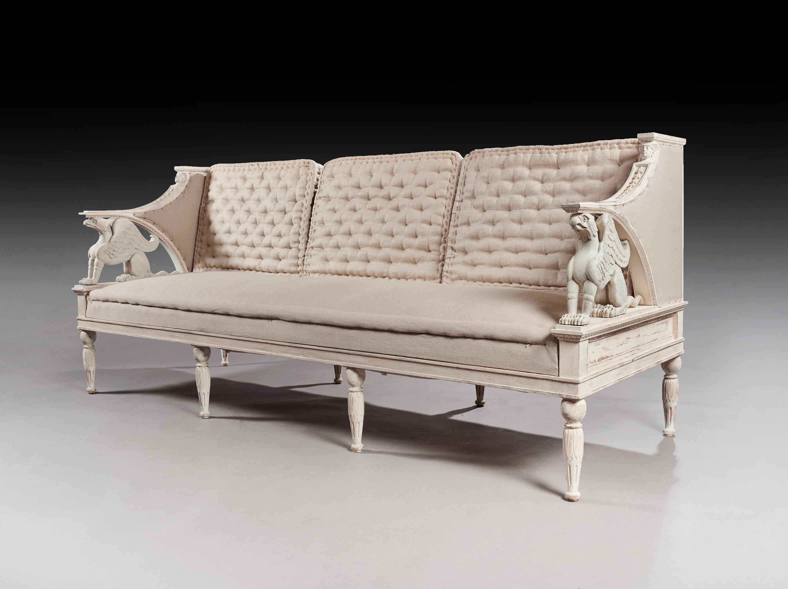 A wonderful and decorative 19th century Swedish Gustavian style sofa with original paintwork.

Swedish, circa 1870.

Constructed from pine, having reversible cushions giving the option of either a buttoned back or plain upholstery back. The back
