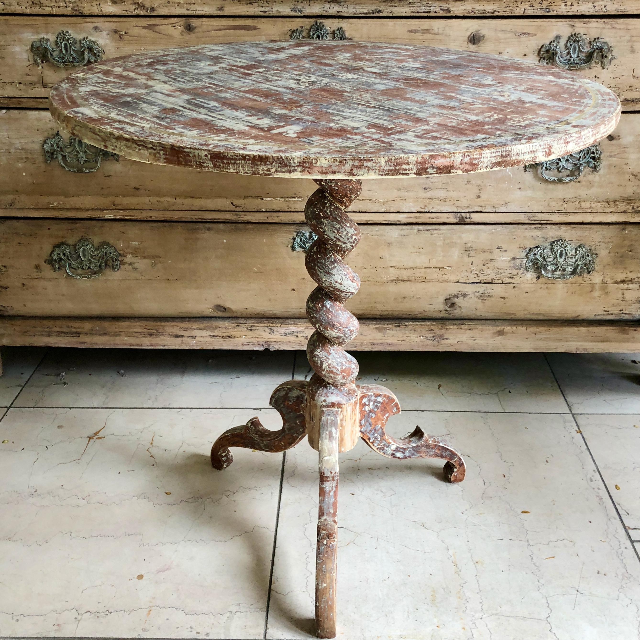 19th century Swedish pedestal table with an intricately turned 