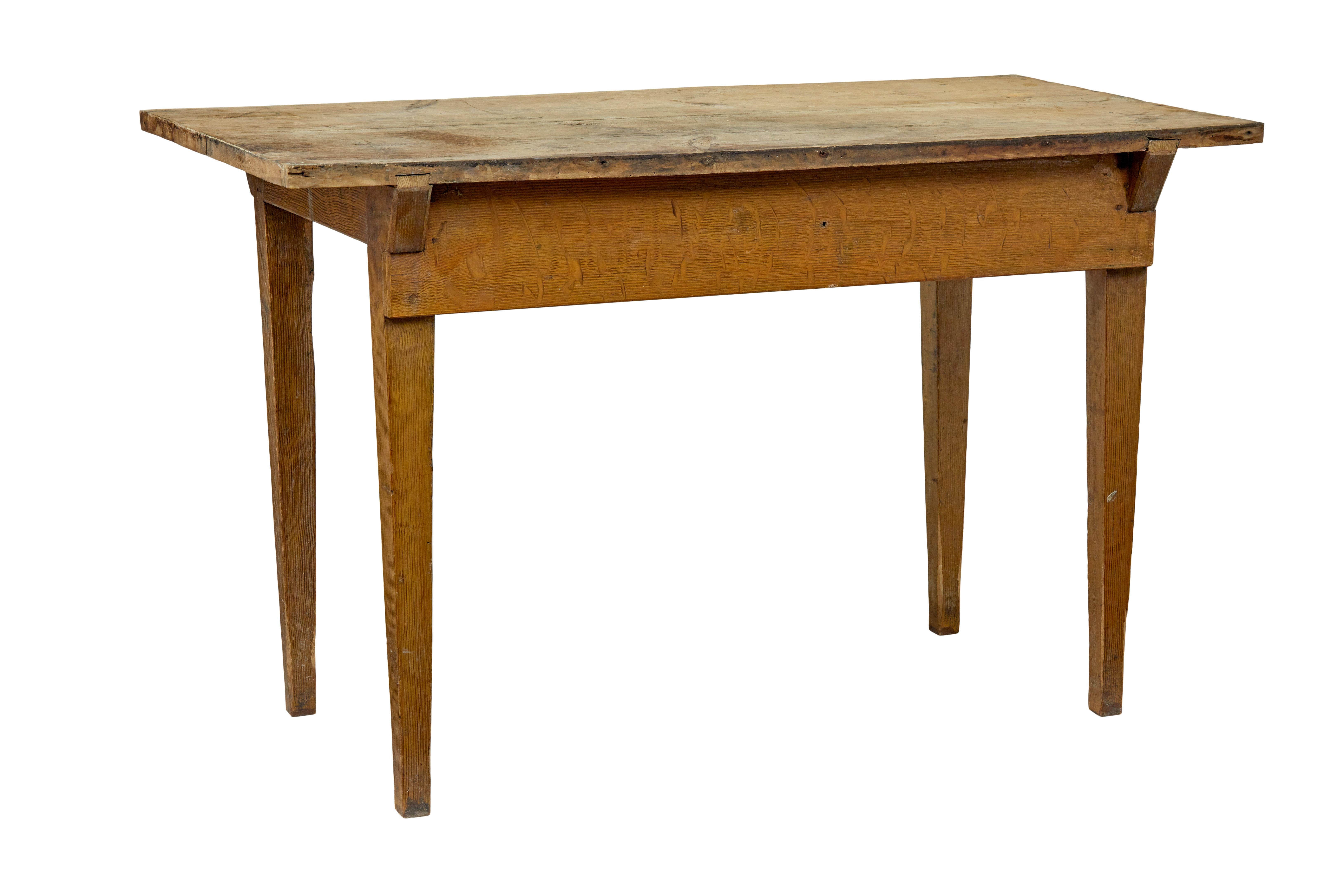 19th century Swedish pine rustic side table circa 1870.

Practical and good quality rustic Swedish side table.  2 plank pine top presented in it's original condition.  Below the top surface is a concealed drawer for storage.   Yellow ochre finish to