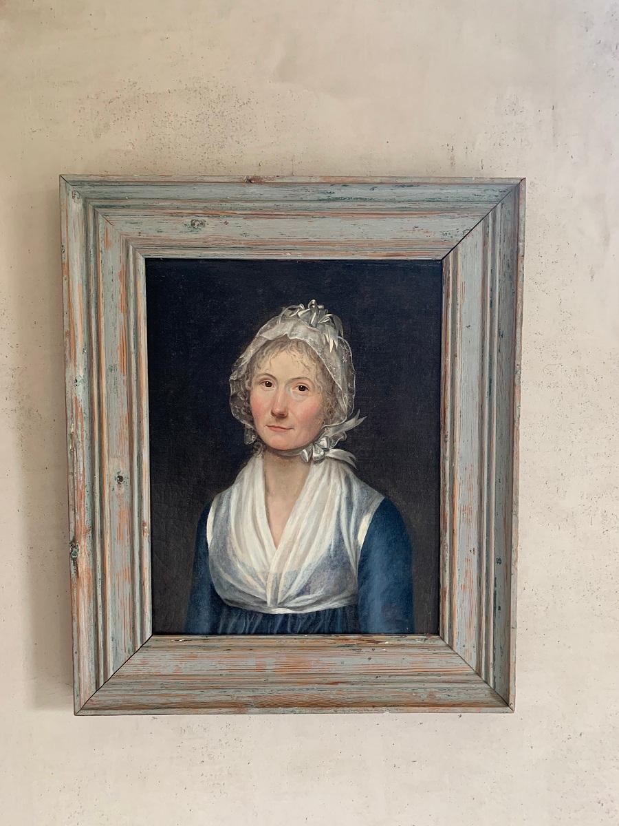 Charmant portrait suédois du 19e siècle d'une dame à l'allure élégante. Huile sur toile dans le cadre original en bois de pin.