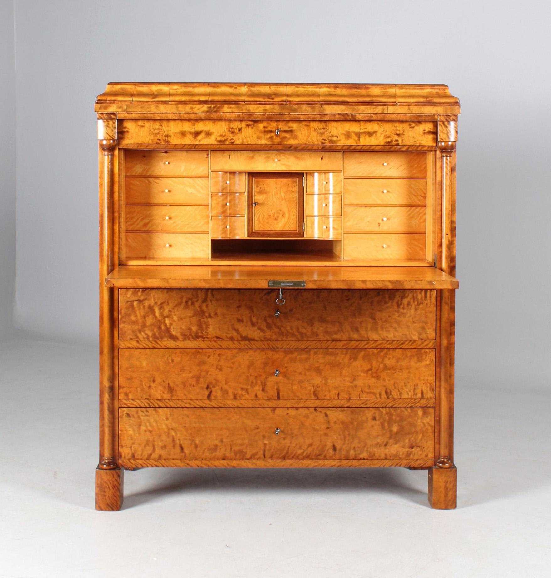Antique secretary with secret compartment

Swedish
birch
second half 19th century

Dimensions: H x W x D: 135 x 112 x 52 cm

Description
Piece of furniture standing on block feet with three drawers at the bottom, a writing flap above and