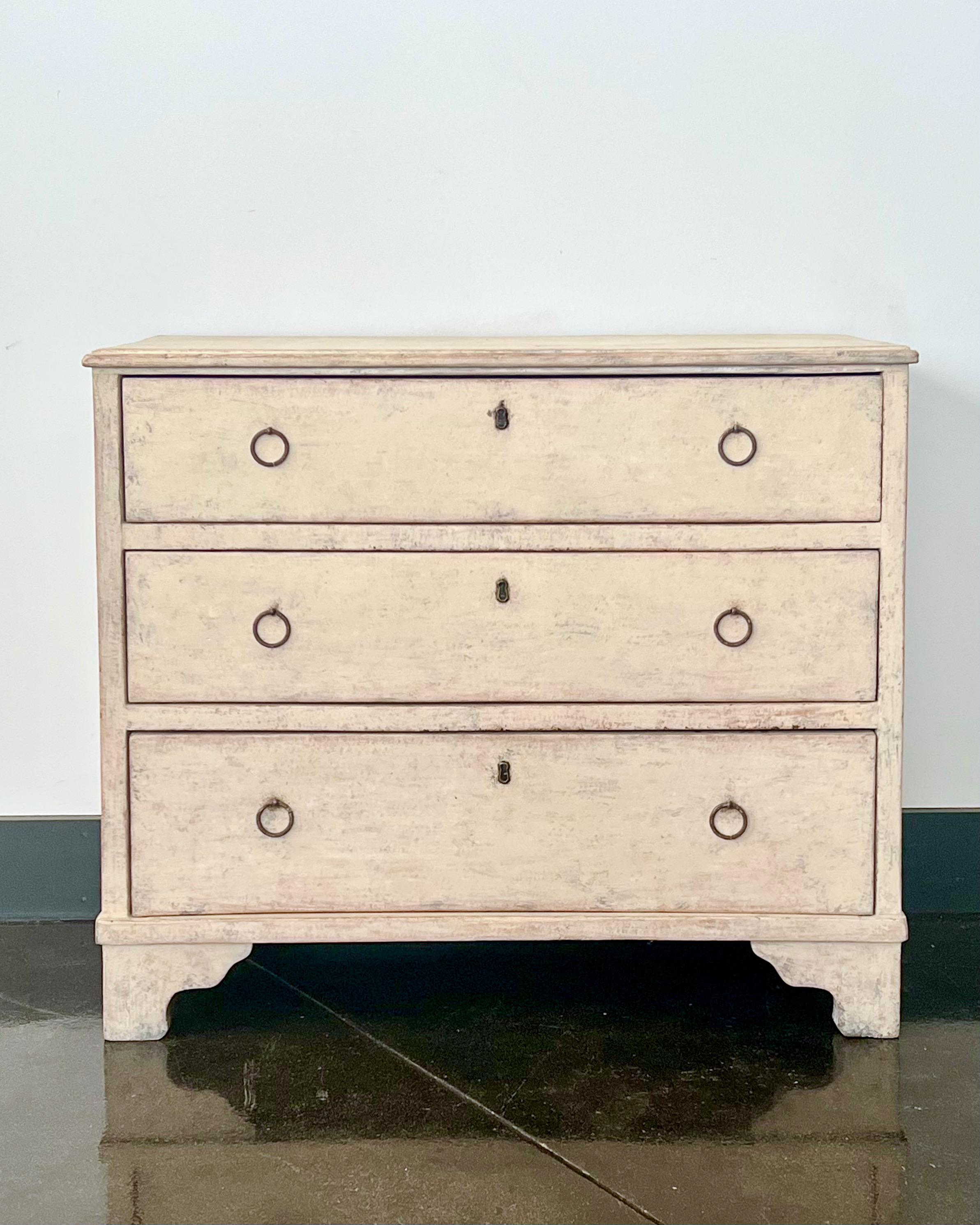 Charming 19th century Swedish three drawers chest on block legs.
Sweden, circa 1840.
 More than ever, we selected the best, the rarest, the unusual, the spectacular, the most charming … what makes people dreaming!