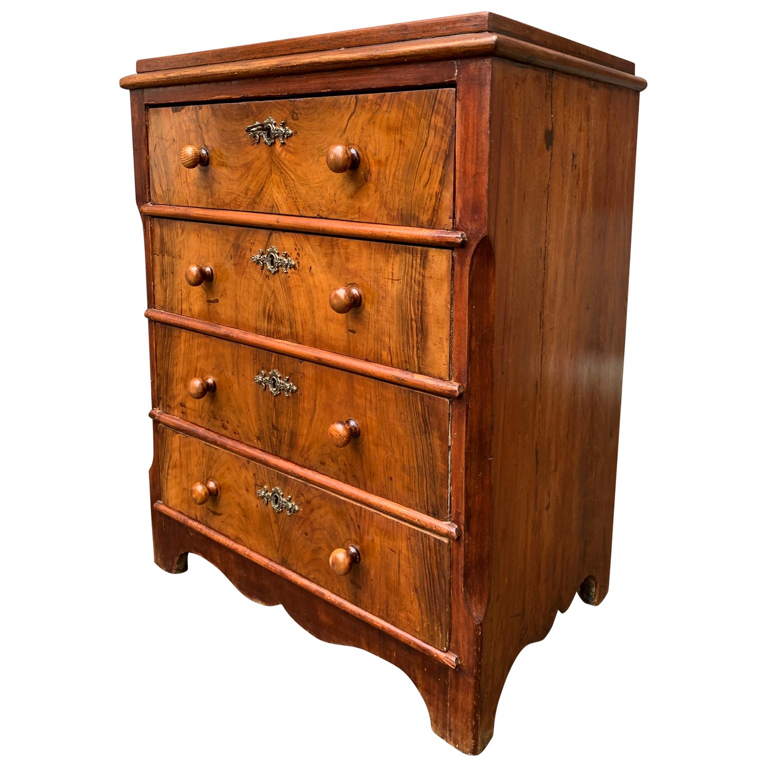 A small 19th century Biedermeier chest of 4 drawers or nightstand from Sweden.