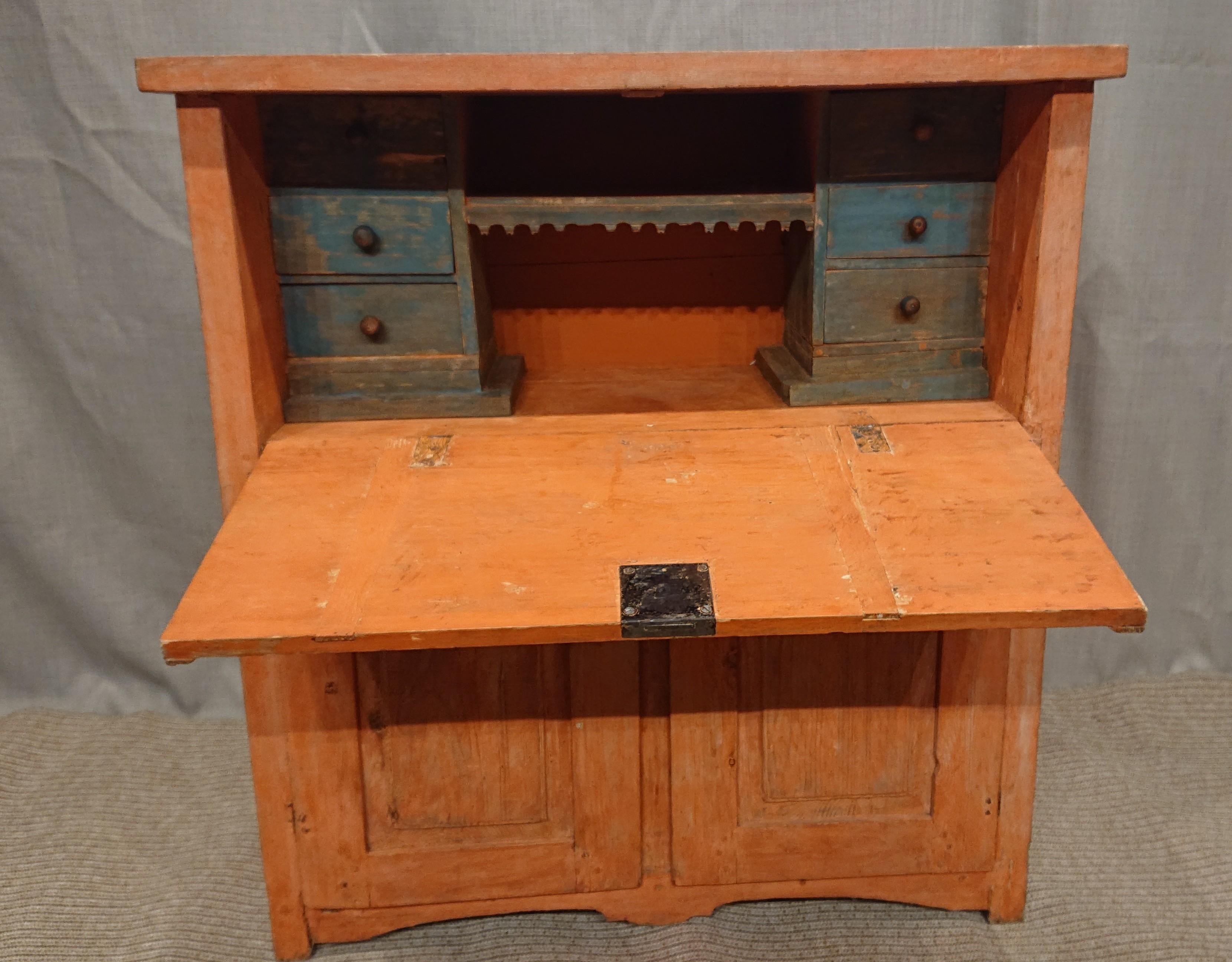 19th century Swedish Gustavian fall front desk from Burtrask Vasterbotten, Northern Sweden.
Scraped by hand to its original color.
Small cute model in child size.
Fits so nicely in the children´s room.
Nicely decorated inside with drawers in