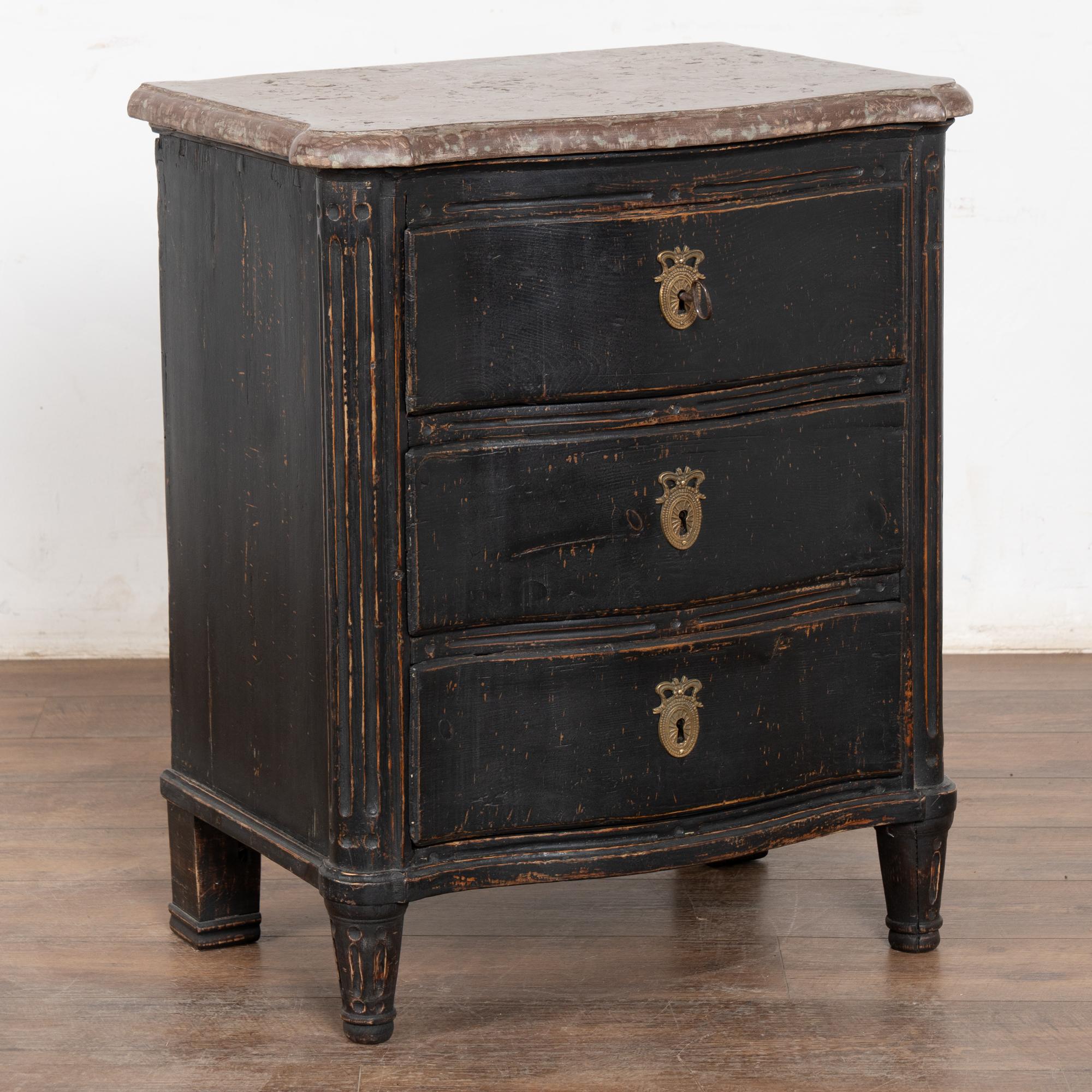 It is the original stone top that makes this small chest of three drawers a special find while the serpentine front adds intrigue as well. Please enlarge photos of the top to appreciate the matrix of the dusky lavender stone unique to eastern