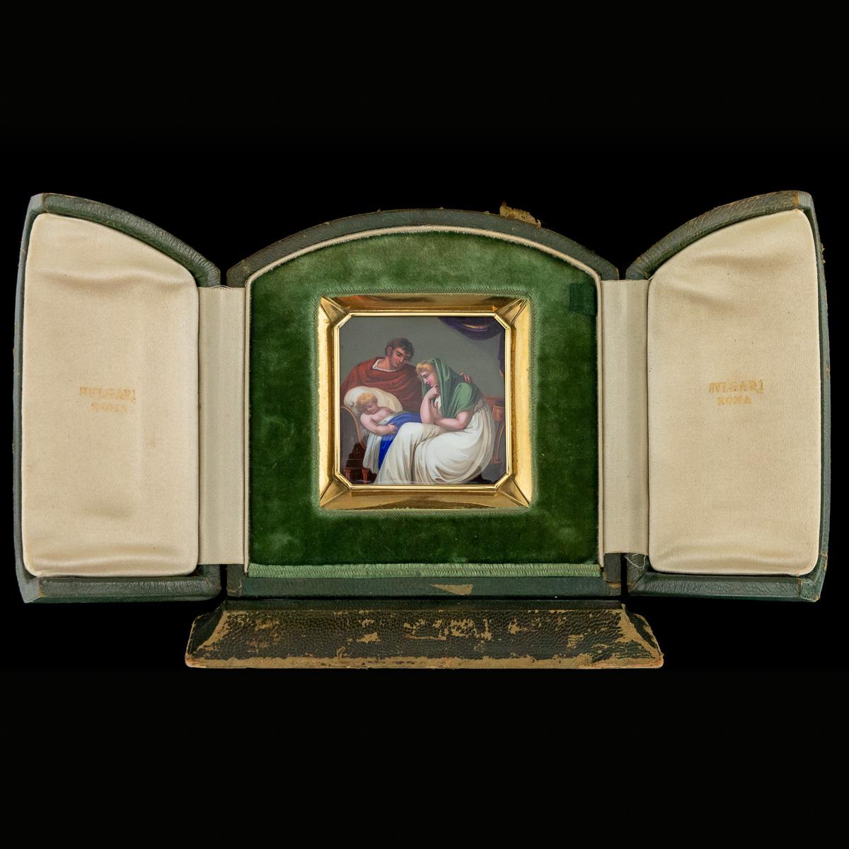 Antique early 19th century Swiss 18-karat gold and hand painted enamel plaque / icon, of square shape with cut corners, set in its original green leather bound traveling case, the plaque finely painted depicting baby Jesus with Mary and Joseph by