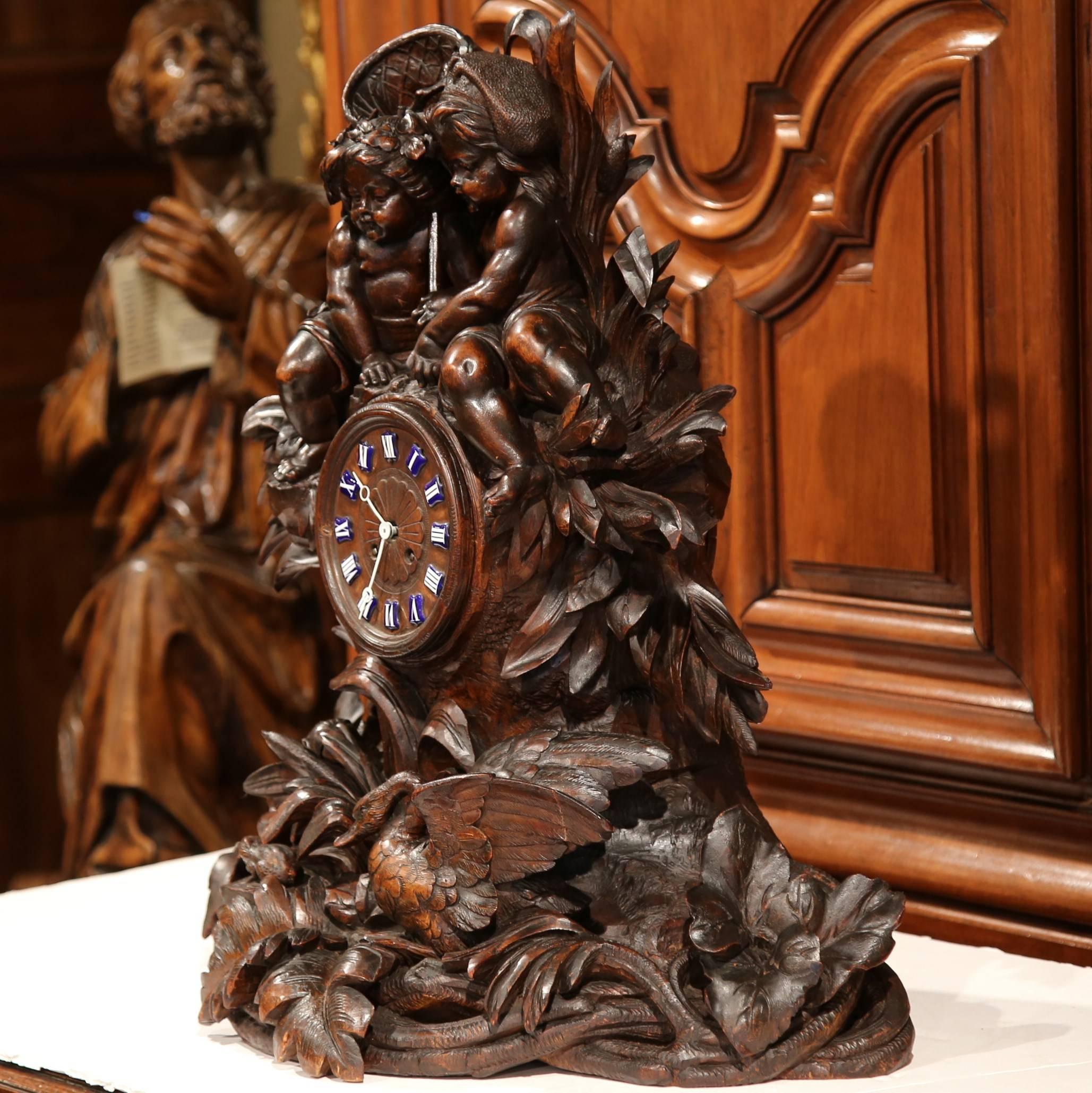 19th Century Swiss Black Forest Carved Walnut Mantel Clock with Cherubs and Bird In Excellent Condition For Sale In Dallas, TX