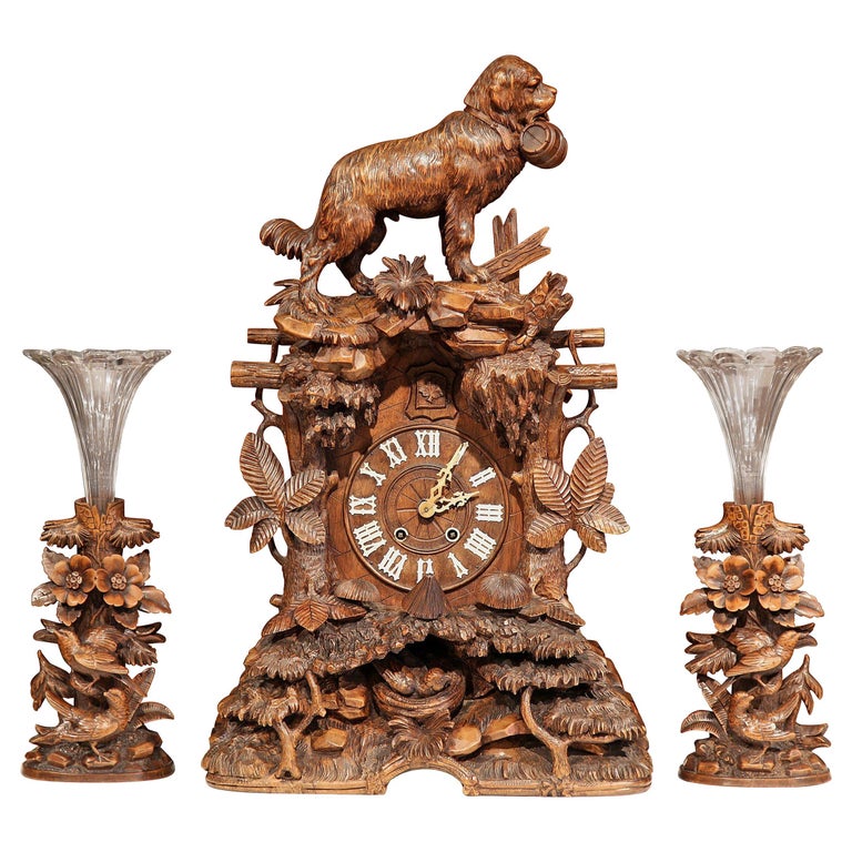 19th Century Swiss Black Forest Carved Walnut ThreePiece Mantel Clock
