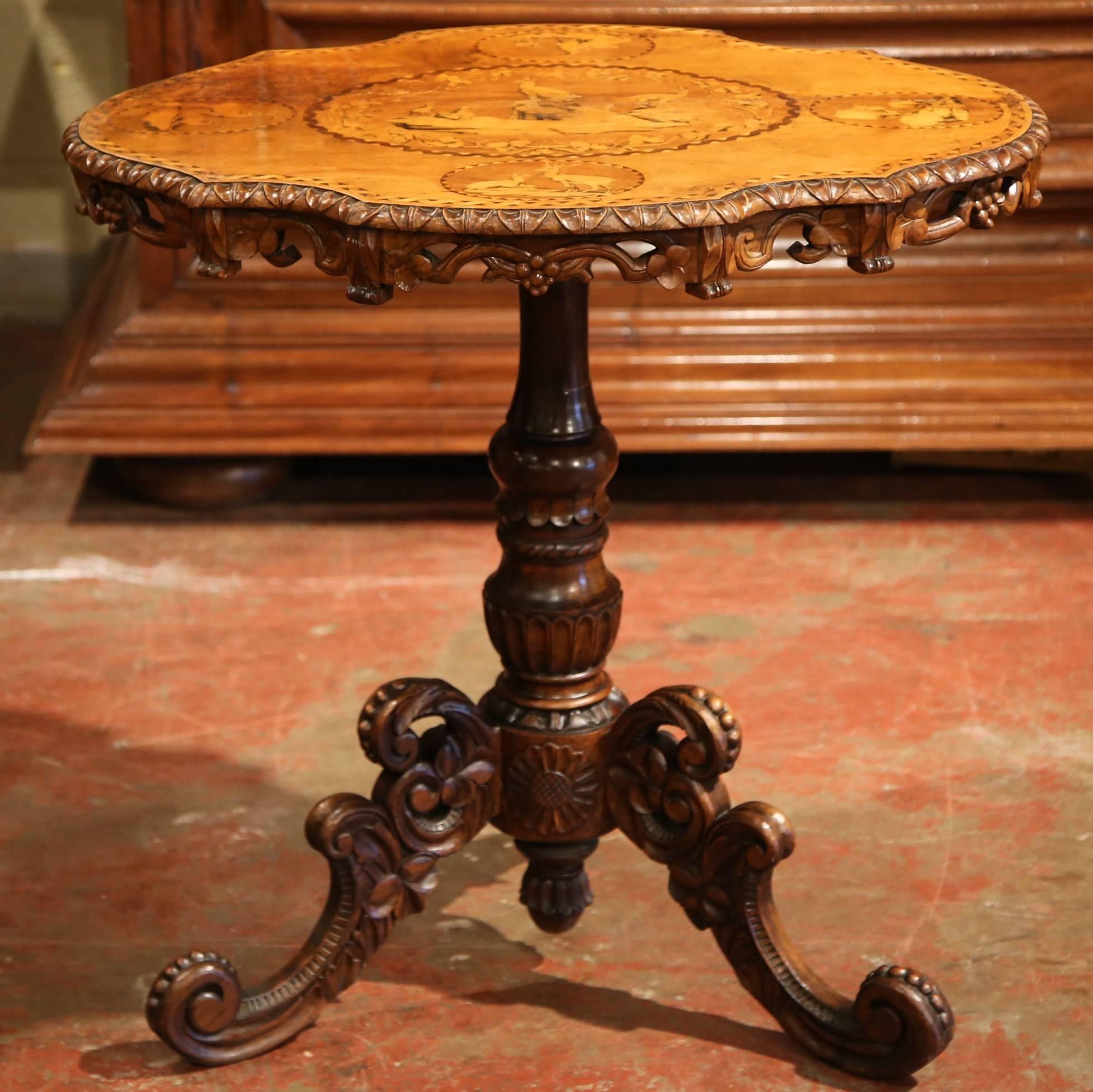 19th Century Swiss Black Forest Carved Walnut Tilt-Top Table with Hunt Scenes In Excellent Condition In Dallas, TX