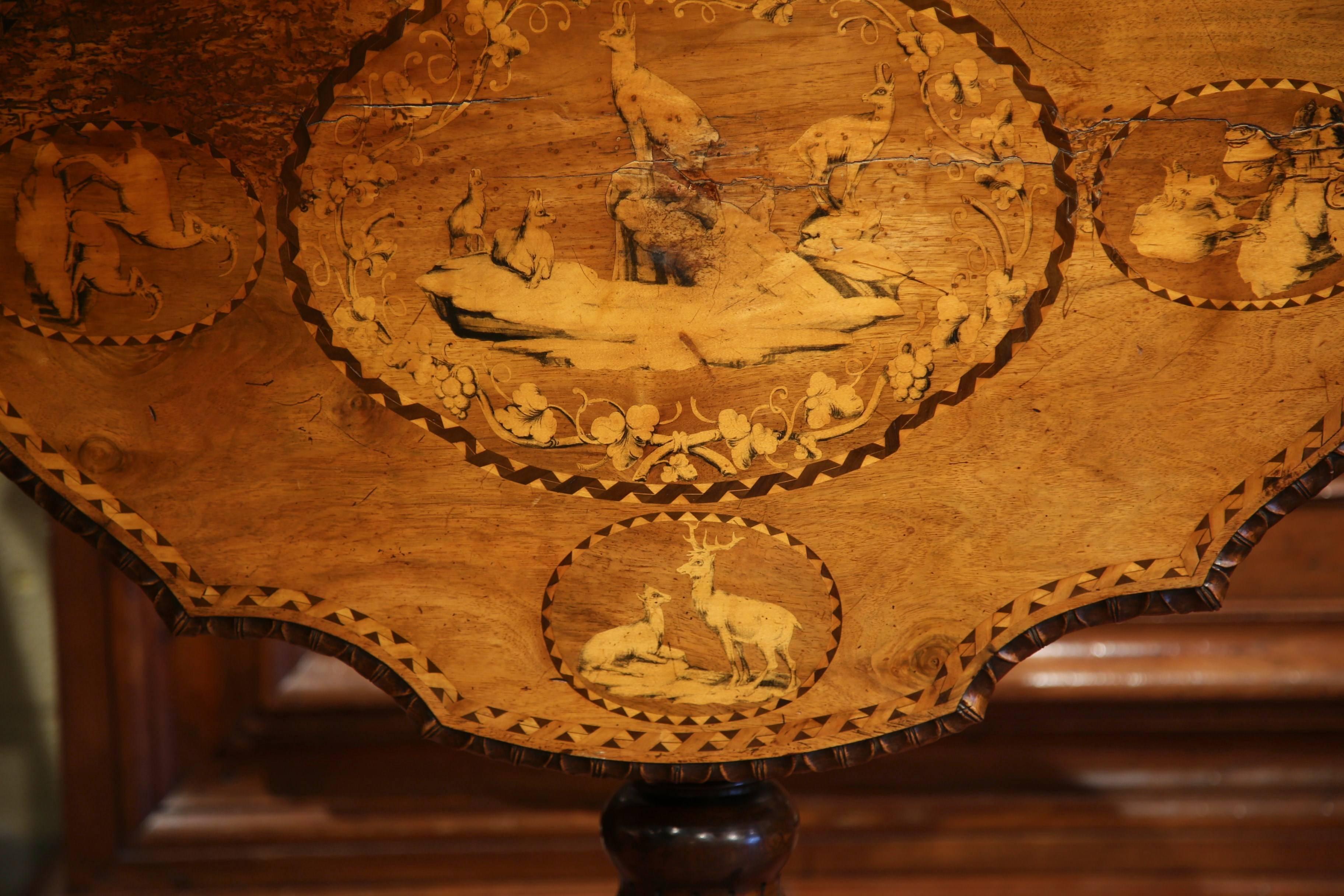 19th Century Swiss Black Forest Carved Walnut Tilt-Top Table with Hunt Scenes 5