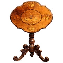 19th Century Swiss Black Forest Carved Walnut Tilt-Top Table with Hunt Scenes