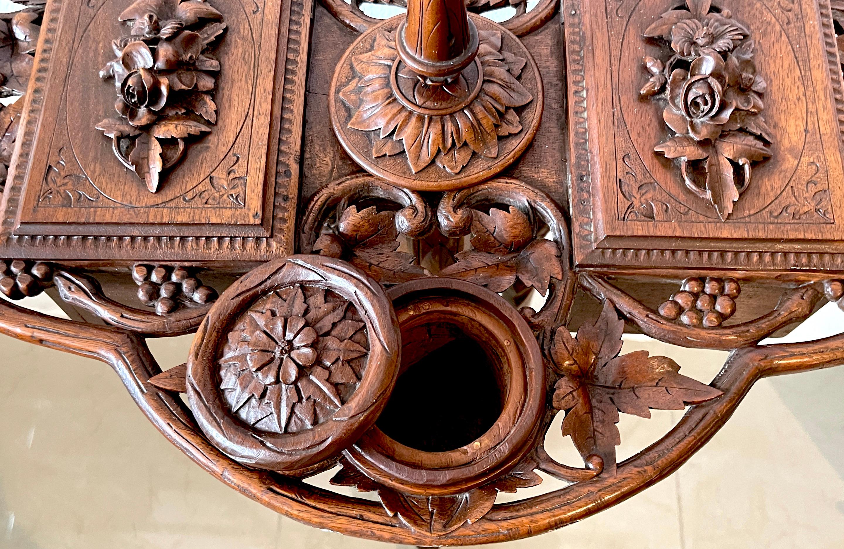 Hand-Carved 19th Century Swiss Black Forrest Carved Walnut Smoking Stand- Complete For Sale