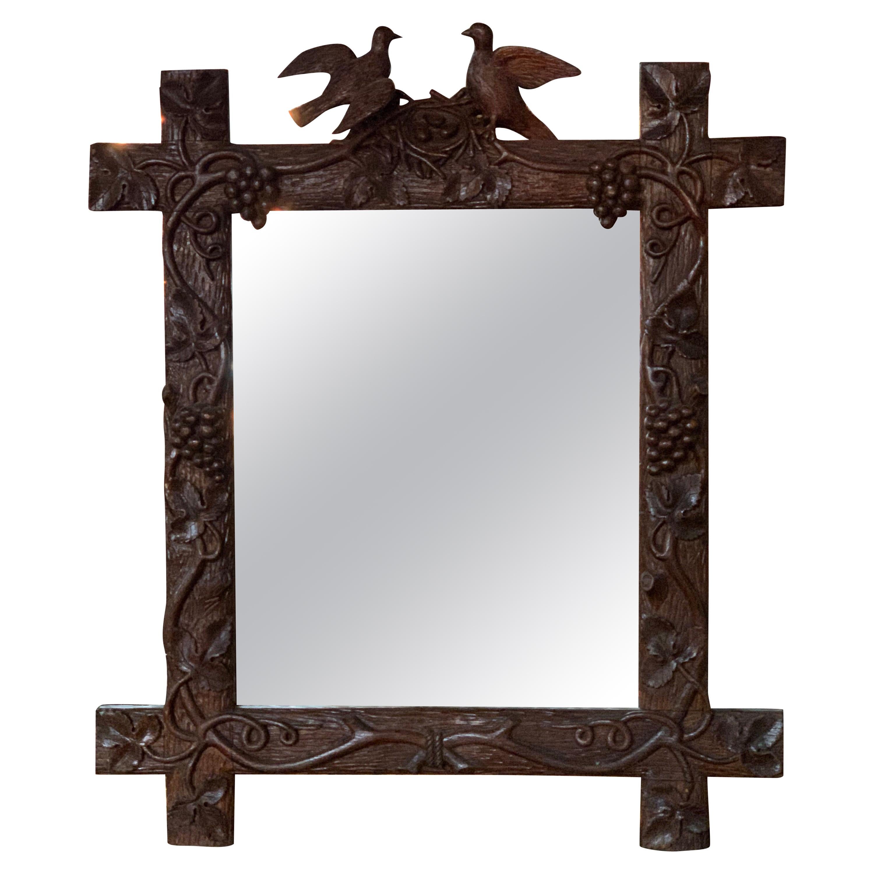 19th Century Swiss Carved Walnut Black Forest Mirror
