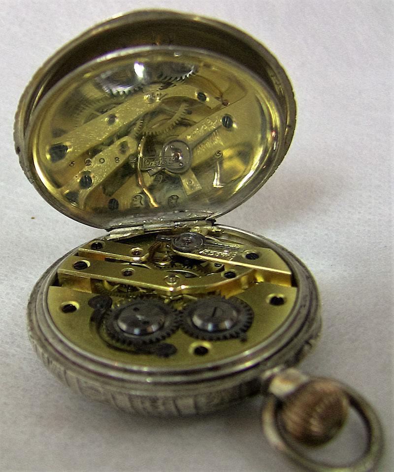 Beautiful ladies Swiss made pocket watch made from solid (sterling silver)…..0.935 standard………half Hunter watch.



19th century Swiss ladies silver pocket watch
Swiss marker…..fully marked…..markers mark “EZ”……Serial No: 59082……0.935 standard
