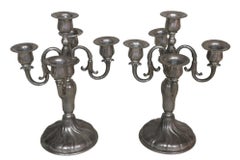 Pareja de candelabros suizos de estaño del siglo XIX
