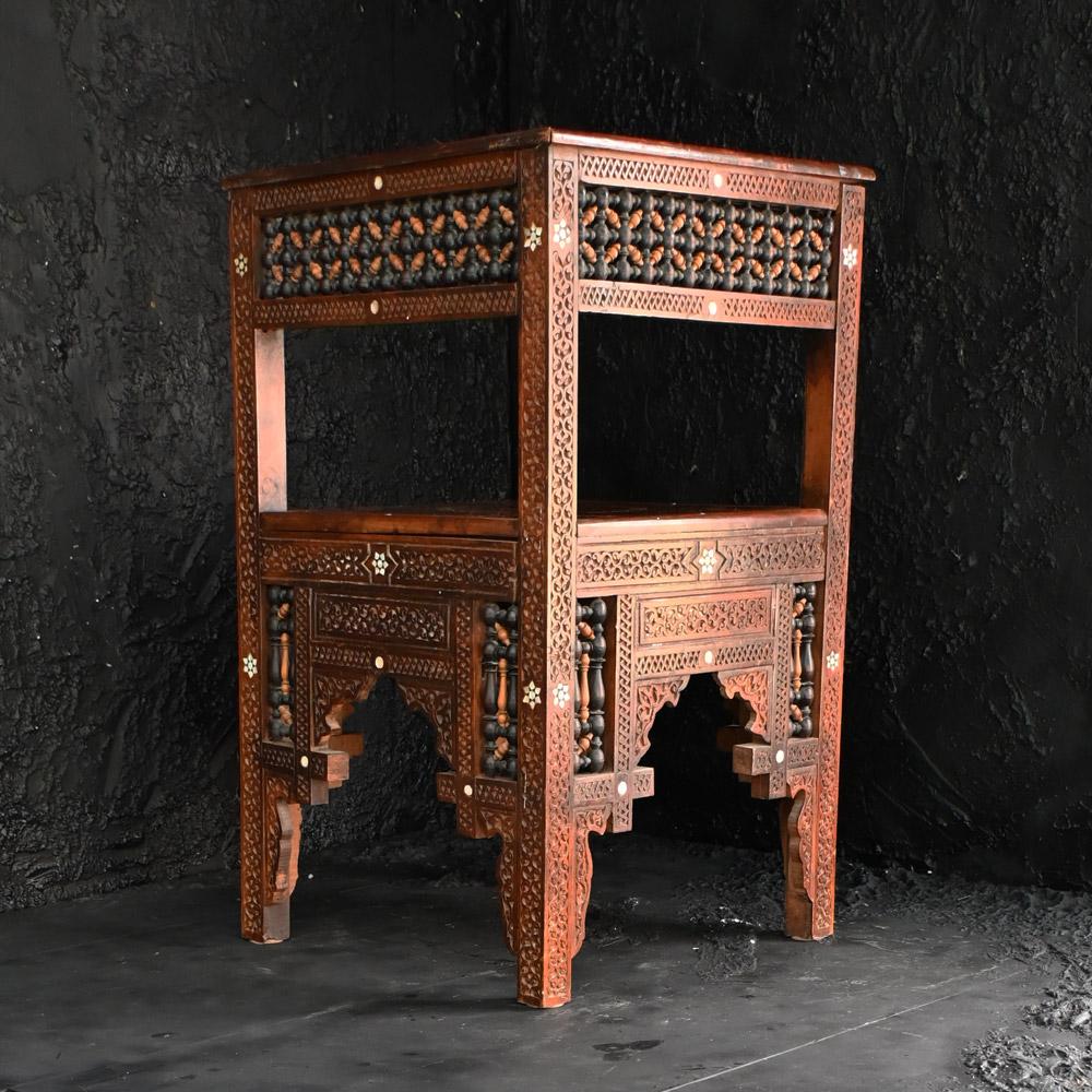 19th Century Syrian Moorish Corner Seat 
A highly decorative example of a late 19th / Early 20th Century hand carved Syrian Moorish corner seat/chair. Made from hardwood sections and hand turned fretwork in place, with simple star work inlay