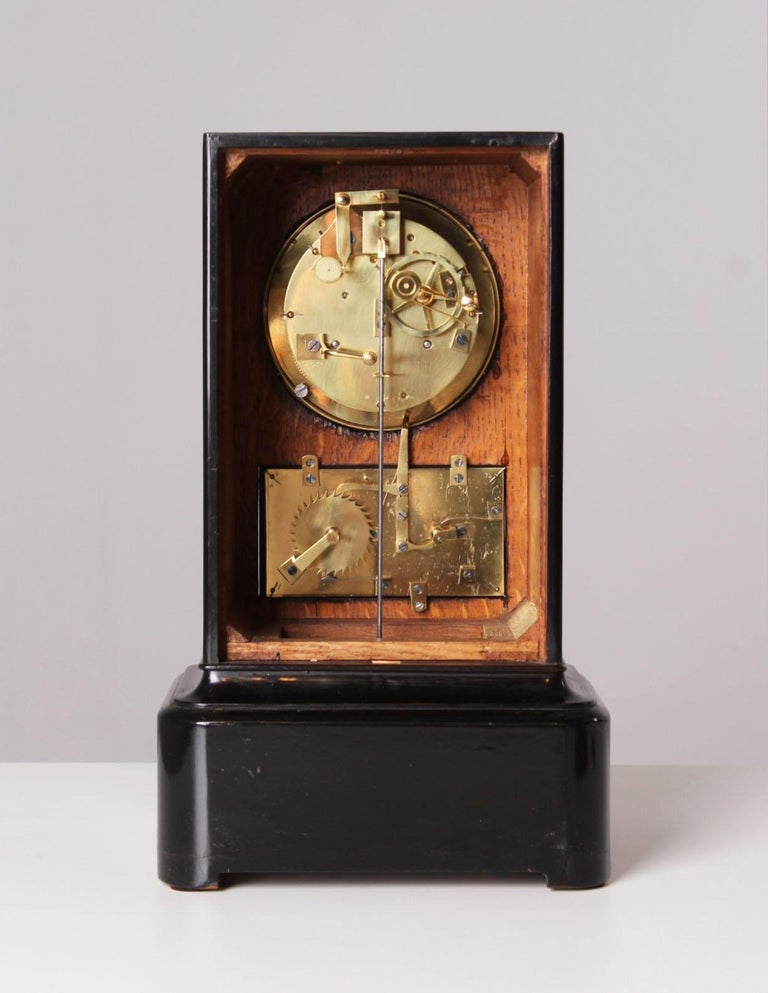 19th Century Table Clock with Calendar, Ebonized Wood, France, circa