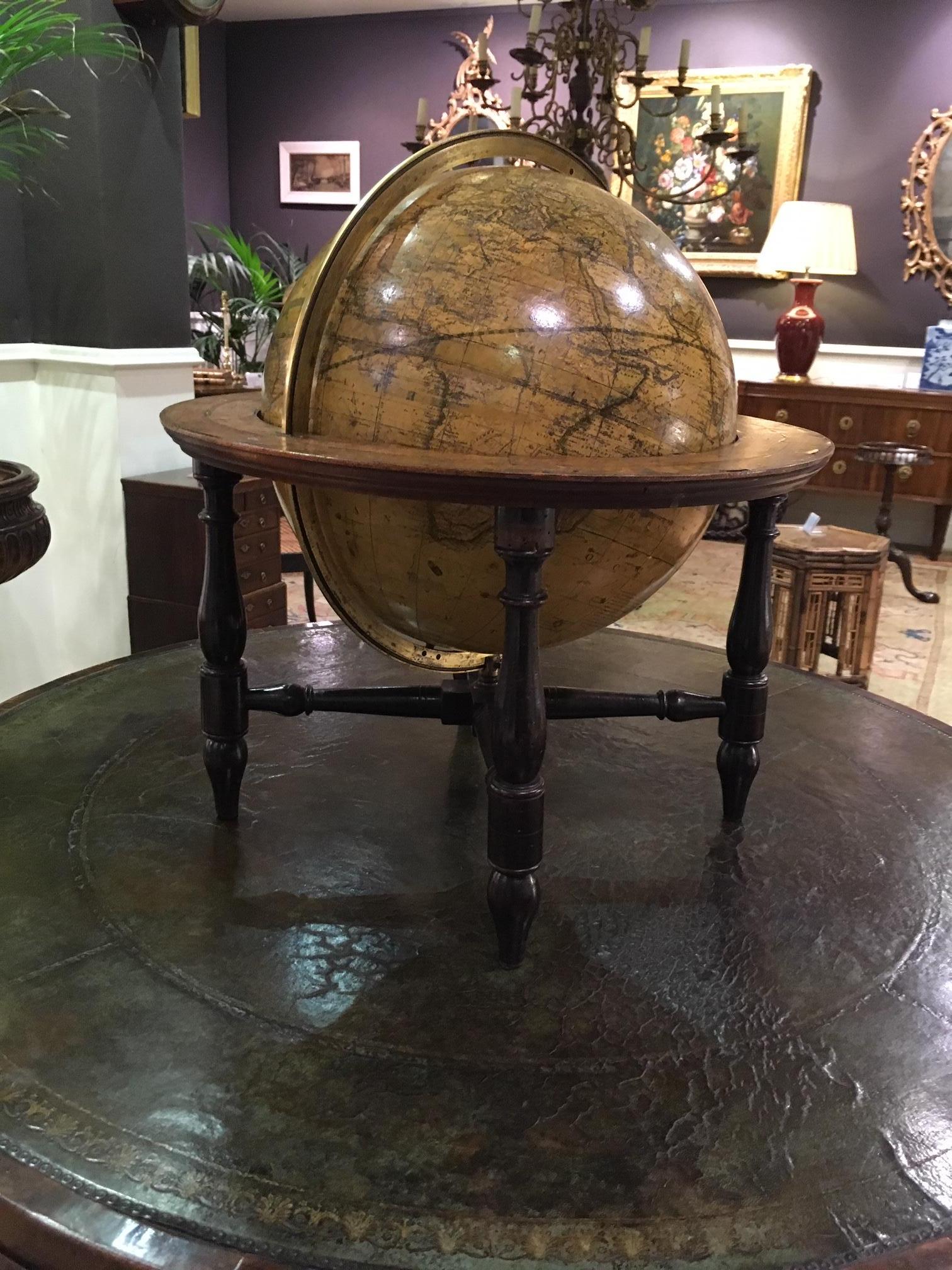 Terrestrial table globe by Donald & Sons, Niddry St Edinburgh. Engraved in 1836 by W & A.K. Johnston. The whole is mounted in an ebonized frame and supported on four turned legs united by stretchers. A/f (as found) showing signs of wear and tear on