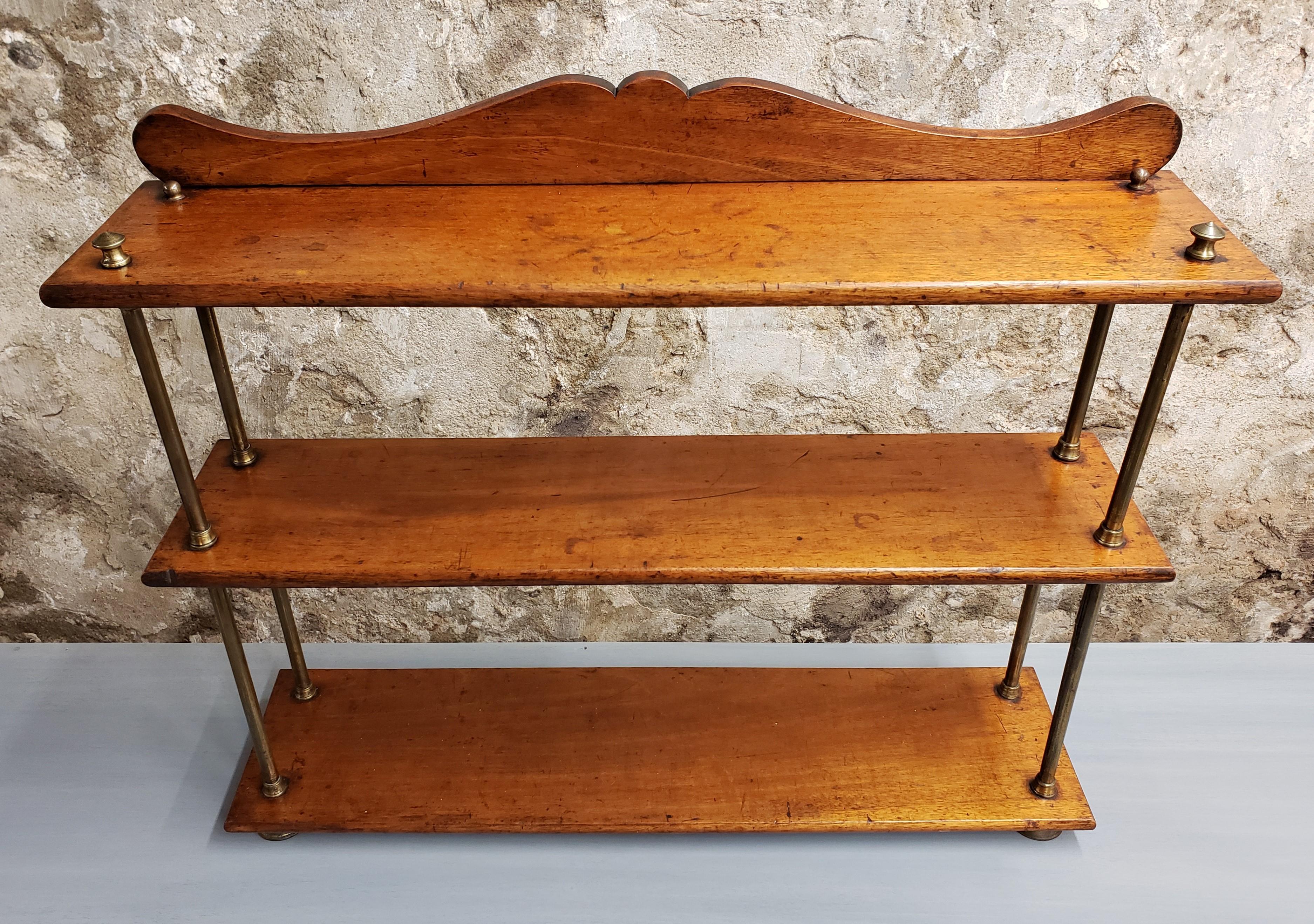 Tabletop shelving unit dating to the 19th century with beautiful rich patina.