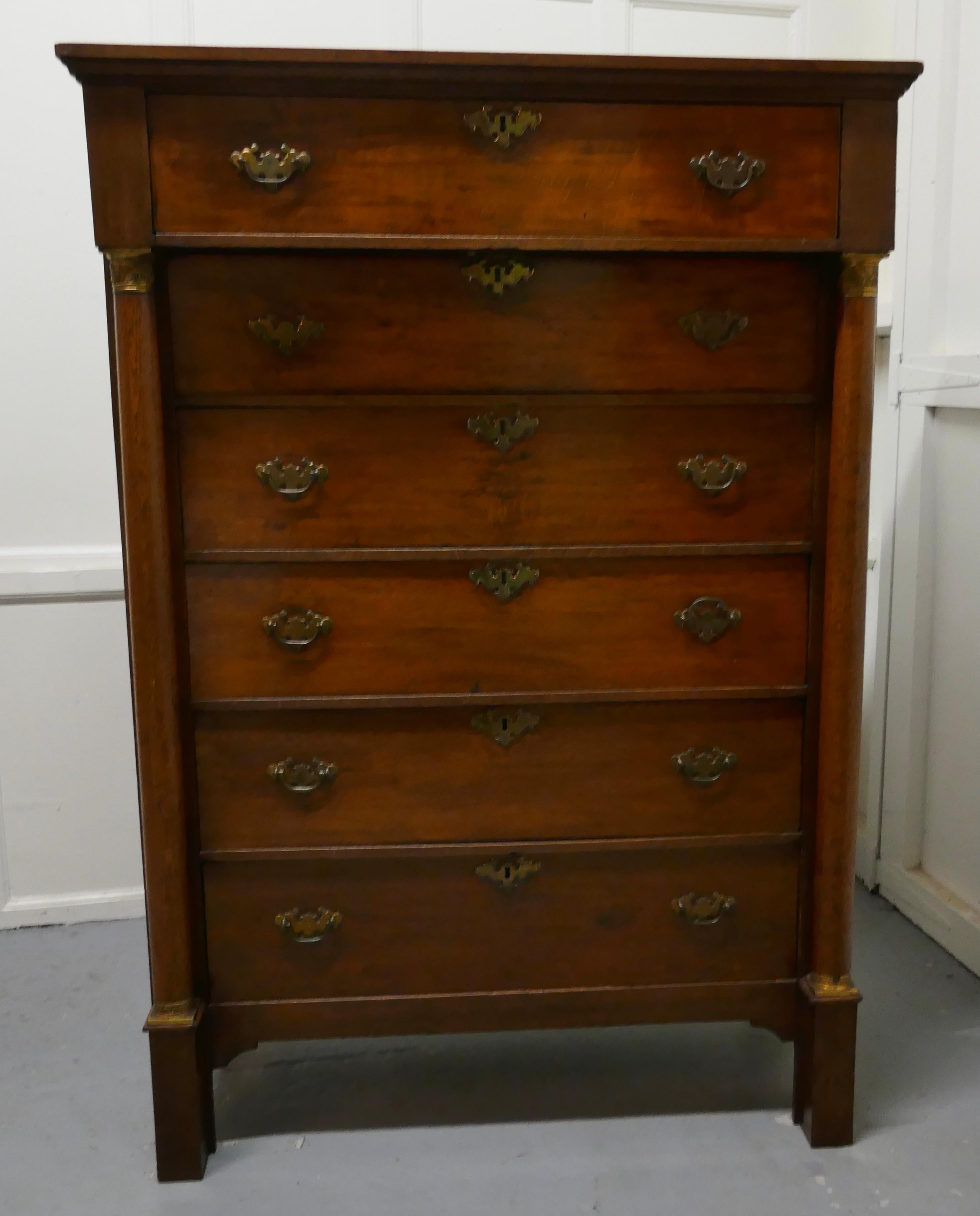 19th Century Tall 6 Drawer Oak Chest of Drawers 

This is a Superb Oak Chest of Drawers it is unusual and a very desirable style of 6 full width drawers
The chest has slender columns on each side set with ormolu mounts 
The drawers have brass swan