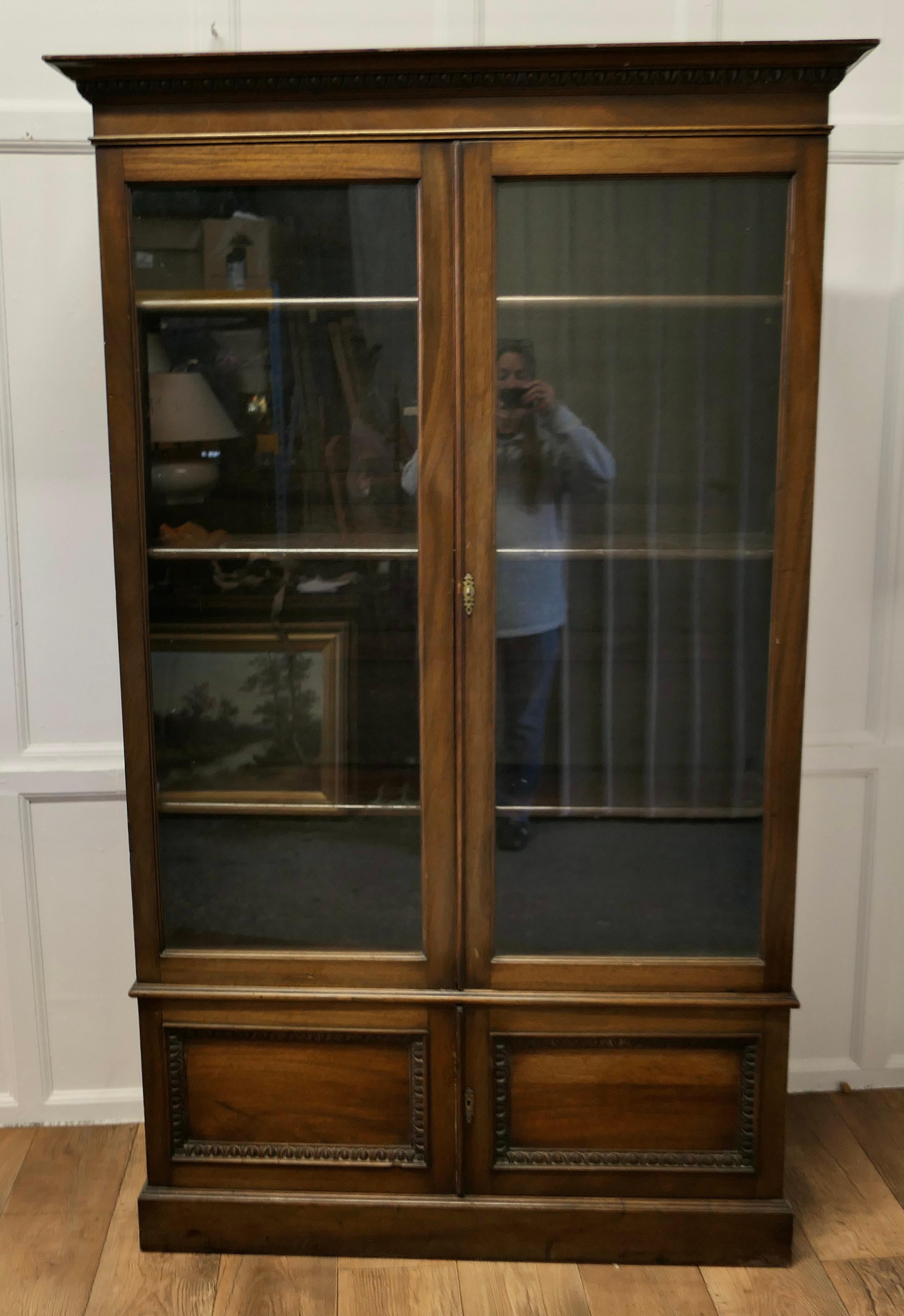 19th century Tall Glazed Bookcase, with Cupboard Under

This is a very useful piece, it has 2 glazed doors above smaller panelled doors
The top cabinet has 3 adjustable shelves to the interior, the bookcase is in good condition, we do not have