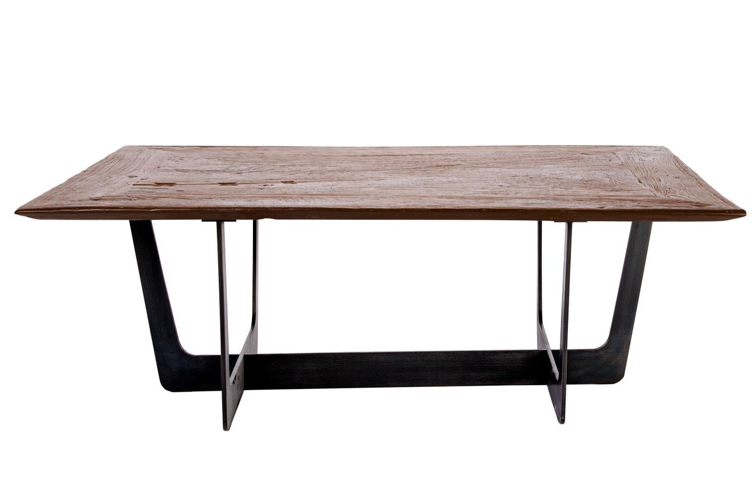 Teak top with custom iron base coffee table

This teak coffee table adds a beautiful and versatile layer into a variety of interior setting. With a generous surface area, it pairs well with modern, large sectionals. The tabletop is a re-purposed