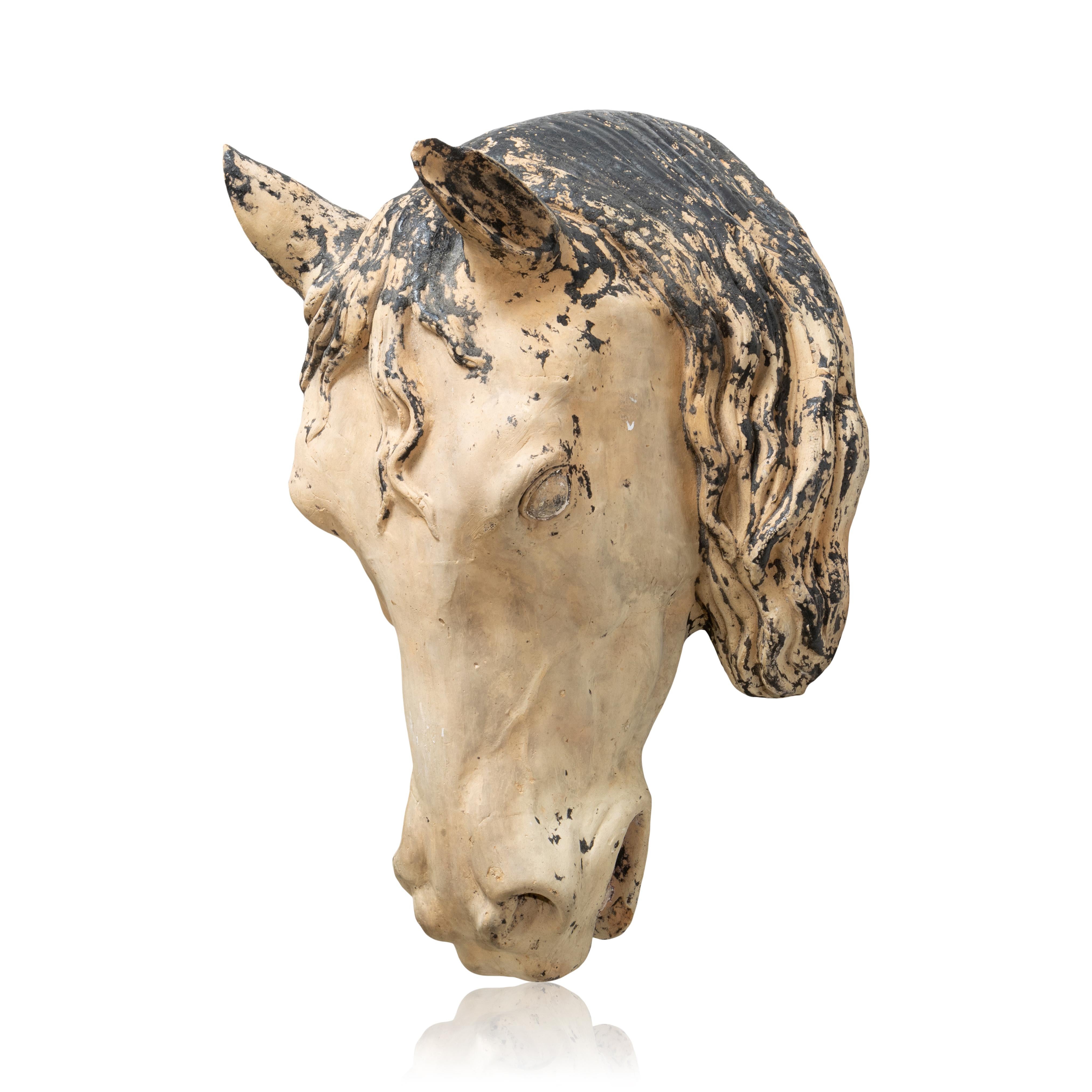 19th century French terracotta horse head trade sign. Nice old white and black paint. 

PERIOD: Late 19th Century
ORIGIN: France, Europe
SIZE: 20