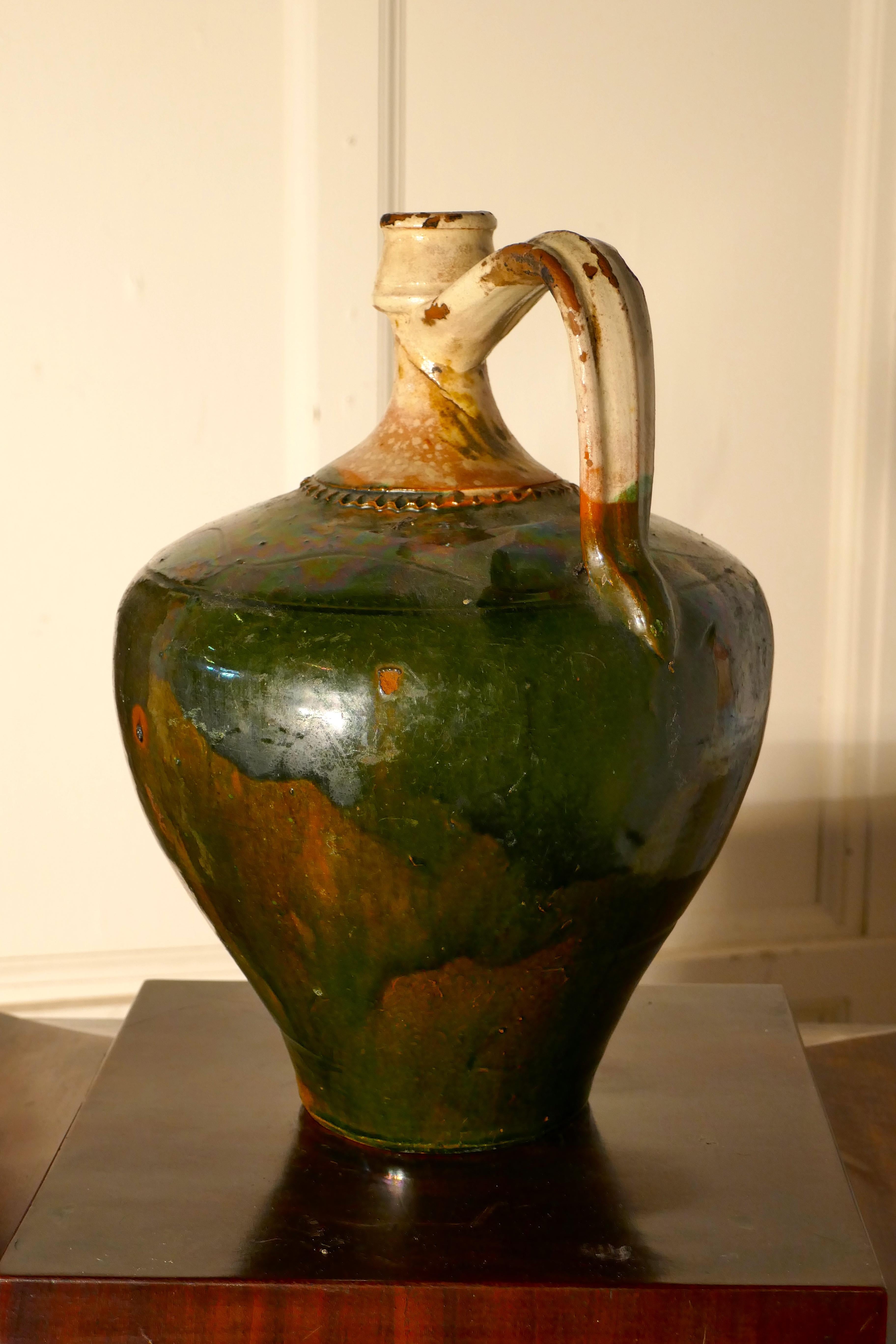 antique olive oil jug