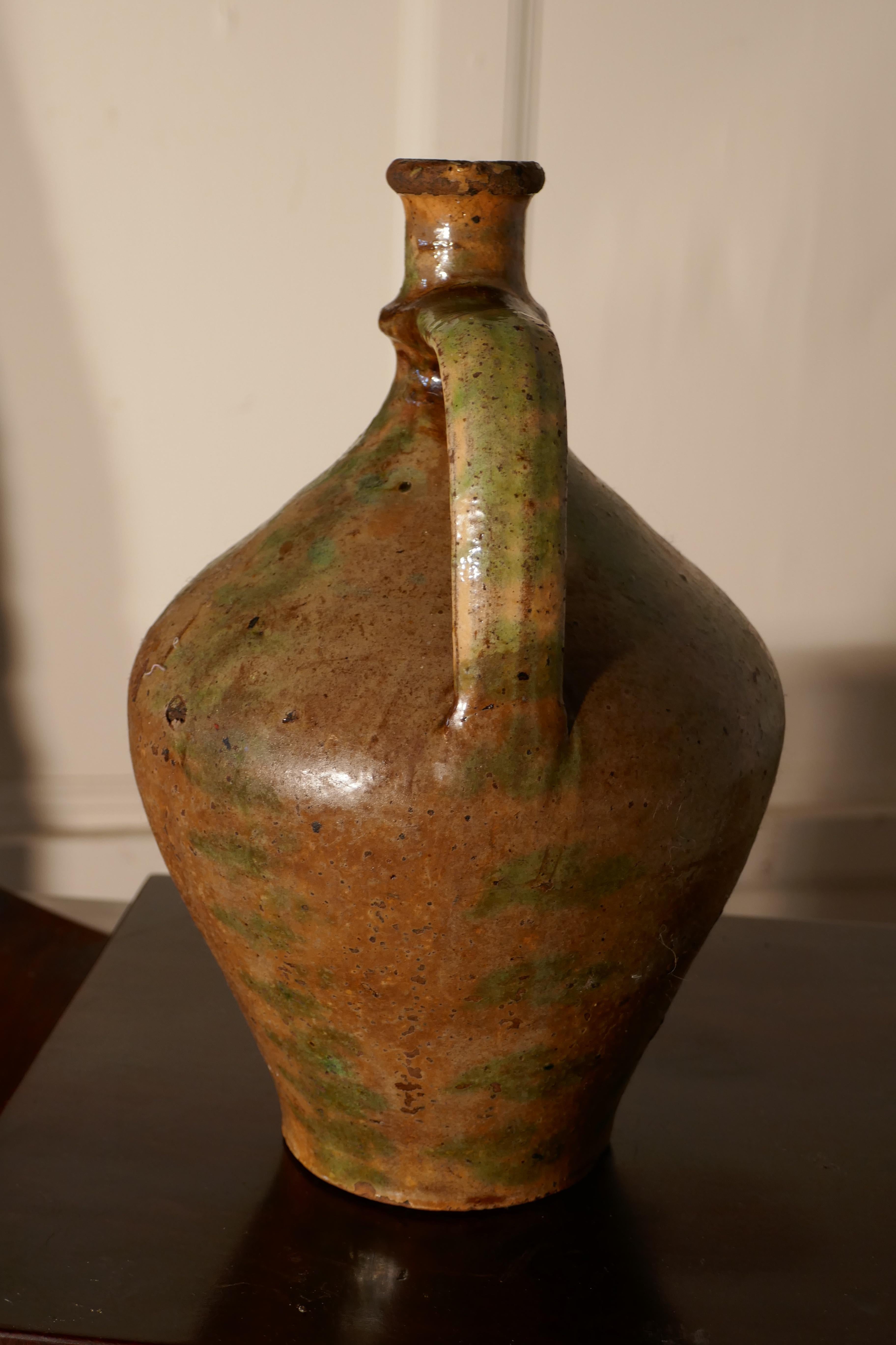 antique olive oil jug