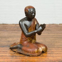 Thai Temple Ceremonial Black Lacquered and Gilt Kneeling Monk Sculpture