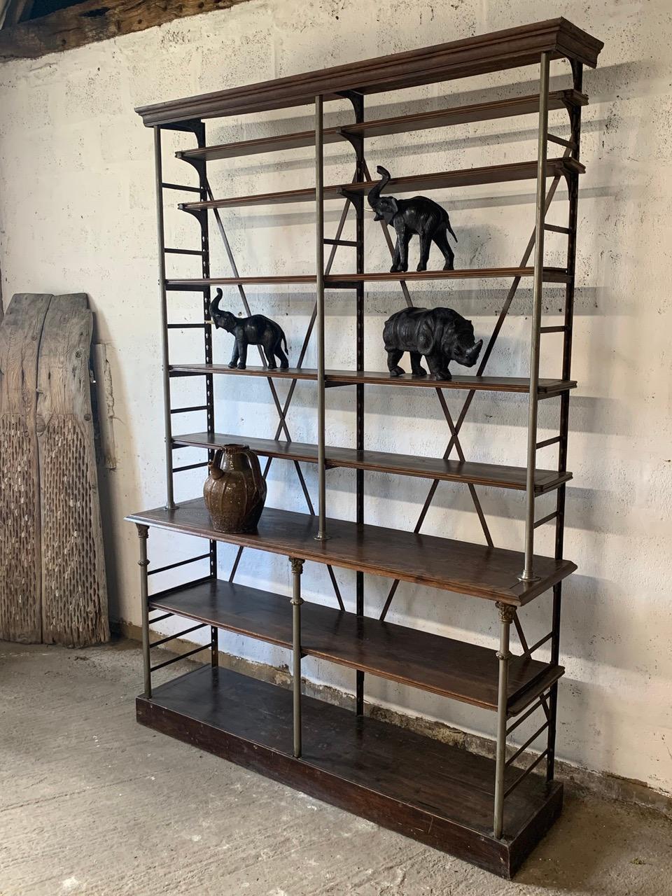 A late 19th century industrial shelving unit by French maker Theodore Scherf. With adjustable shelves.