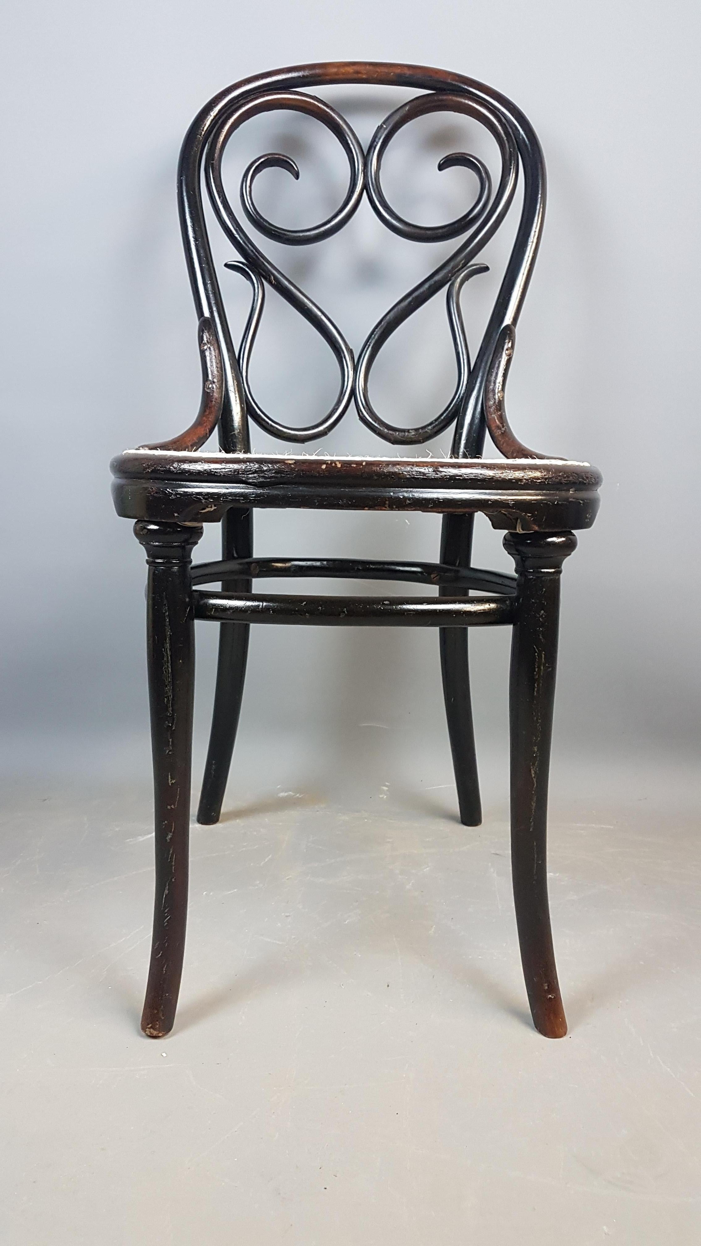 A good rare original example of this iconic bentwood chair from Michael Thonet, this one is model No.4 and is in good original condition with a few age cracks to the bentwood back and marks to the original ebonized finish. This one has been freshly