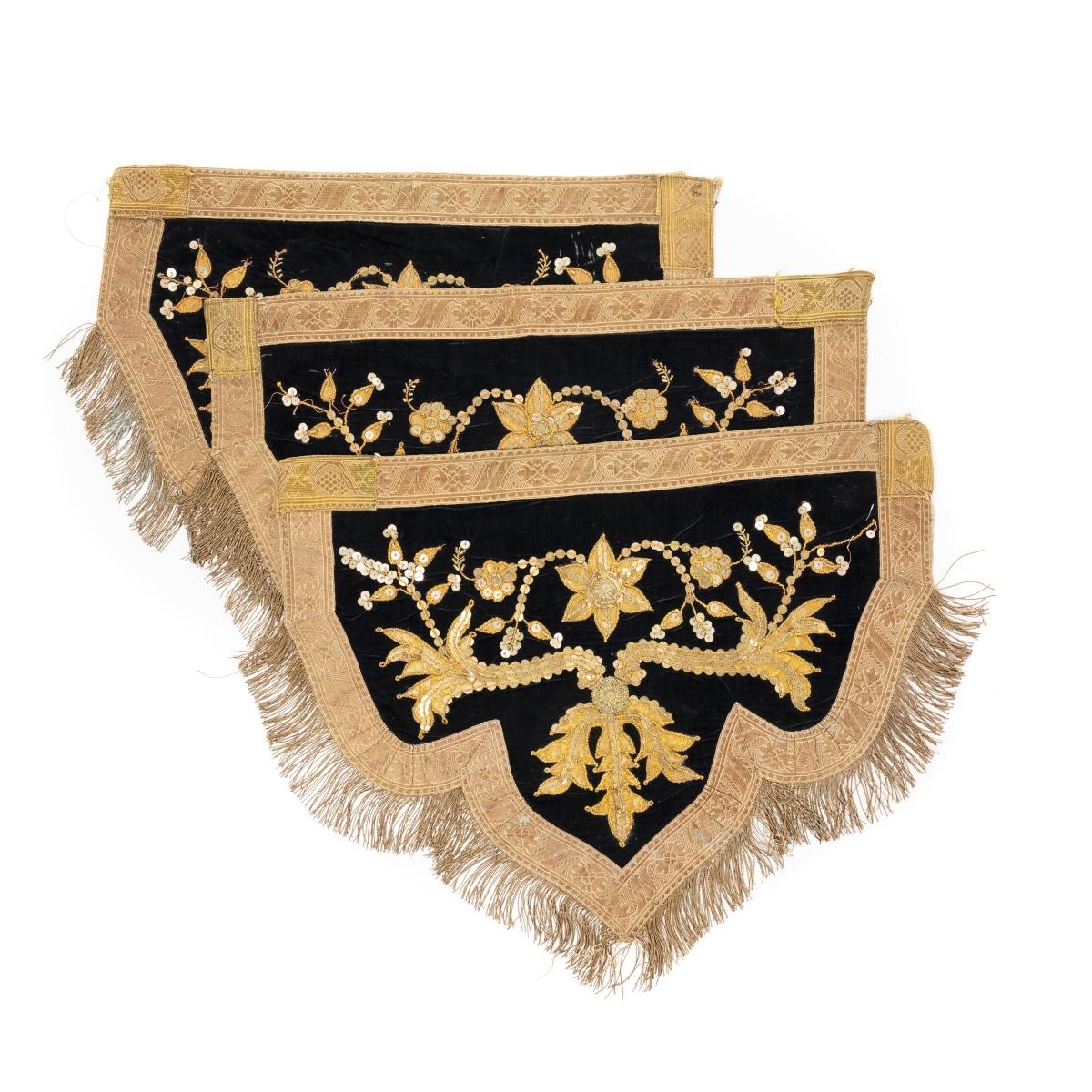 This lot comprises three altar cloths of Portuguese origin, dating from the 19th century, and exemplifying the refinement of ecclesiastical textile art from the period. Each cloth is crafted from rich velvet, a luxurious fabric traditionally