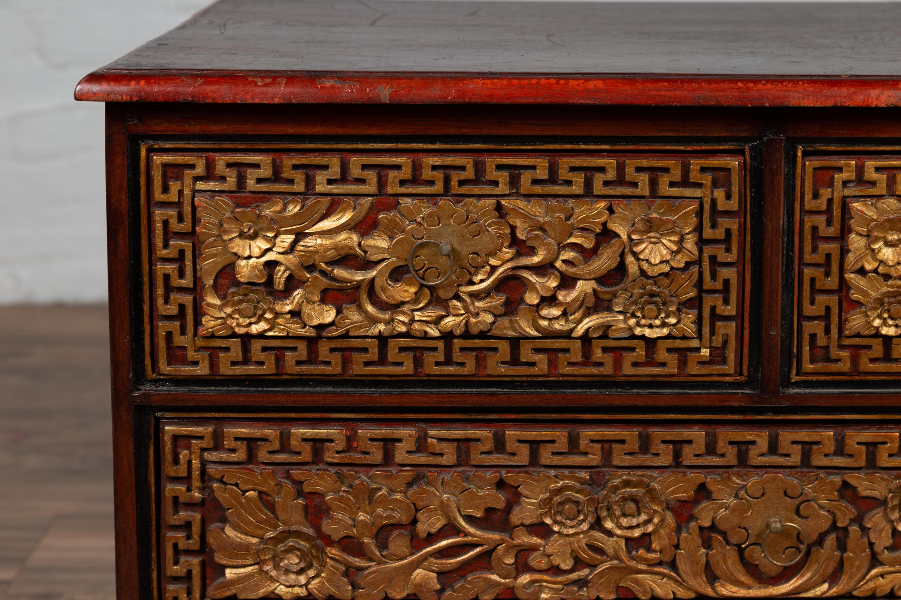 20th Century Three-Drawer Dresser from Madura with Richly Carved Floral Decor and Greek Key