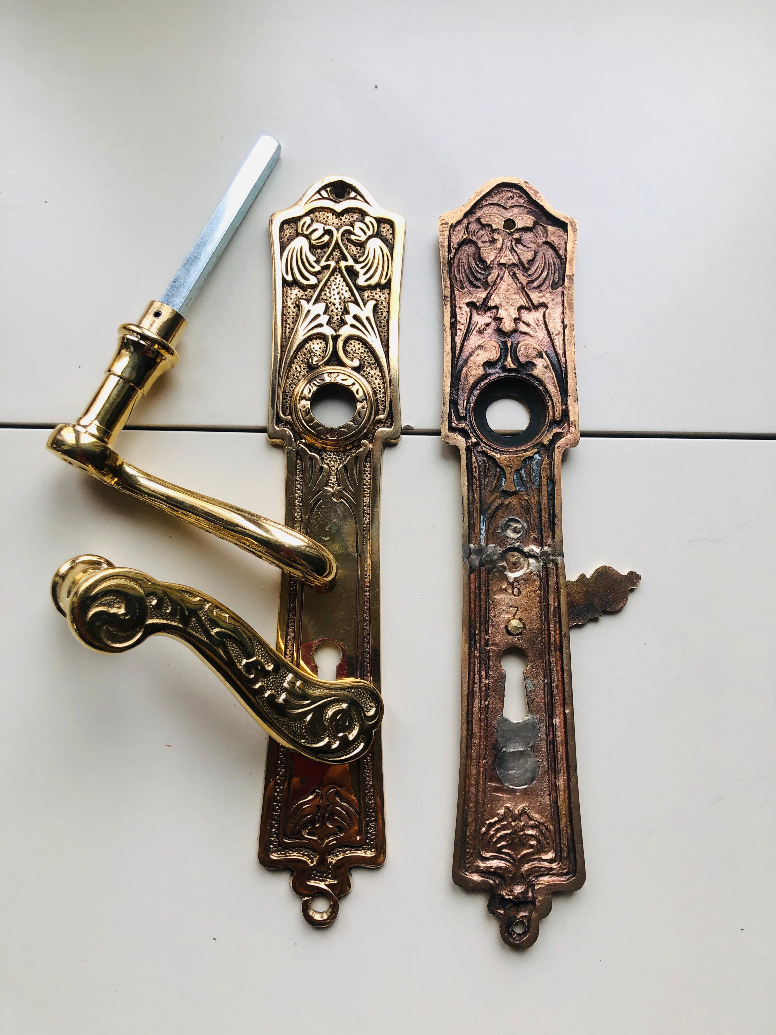 Three French brass door Classic handles adapted to actual standards of use. The restoration is visible only on the backside. Very heavy and solid pieces, France, circa 1860.
   
  