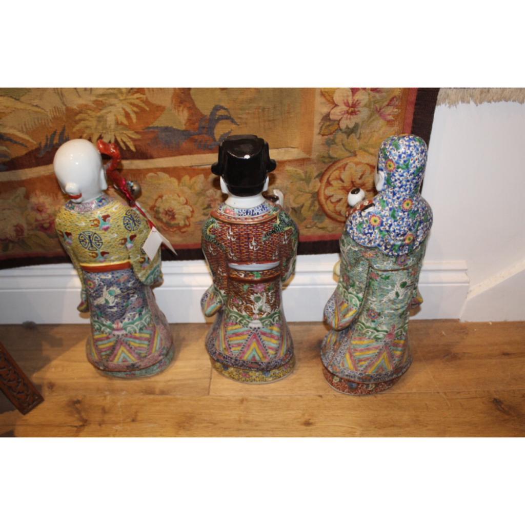 19th century, a set of three large porcelain statues representing the 'Sanxing' or 'Three Stars'. They represent the Immortal Gods: Fu, Lu, and Shou, (arranged specially in this particular order) who are said to bring happiness, prosperity/status