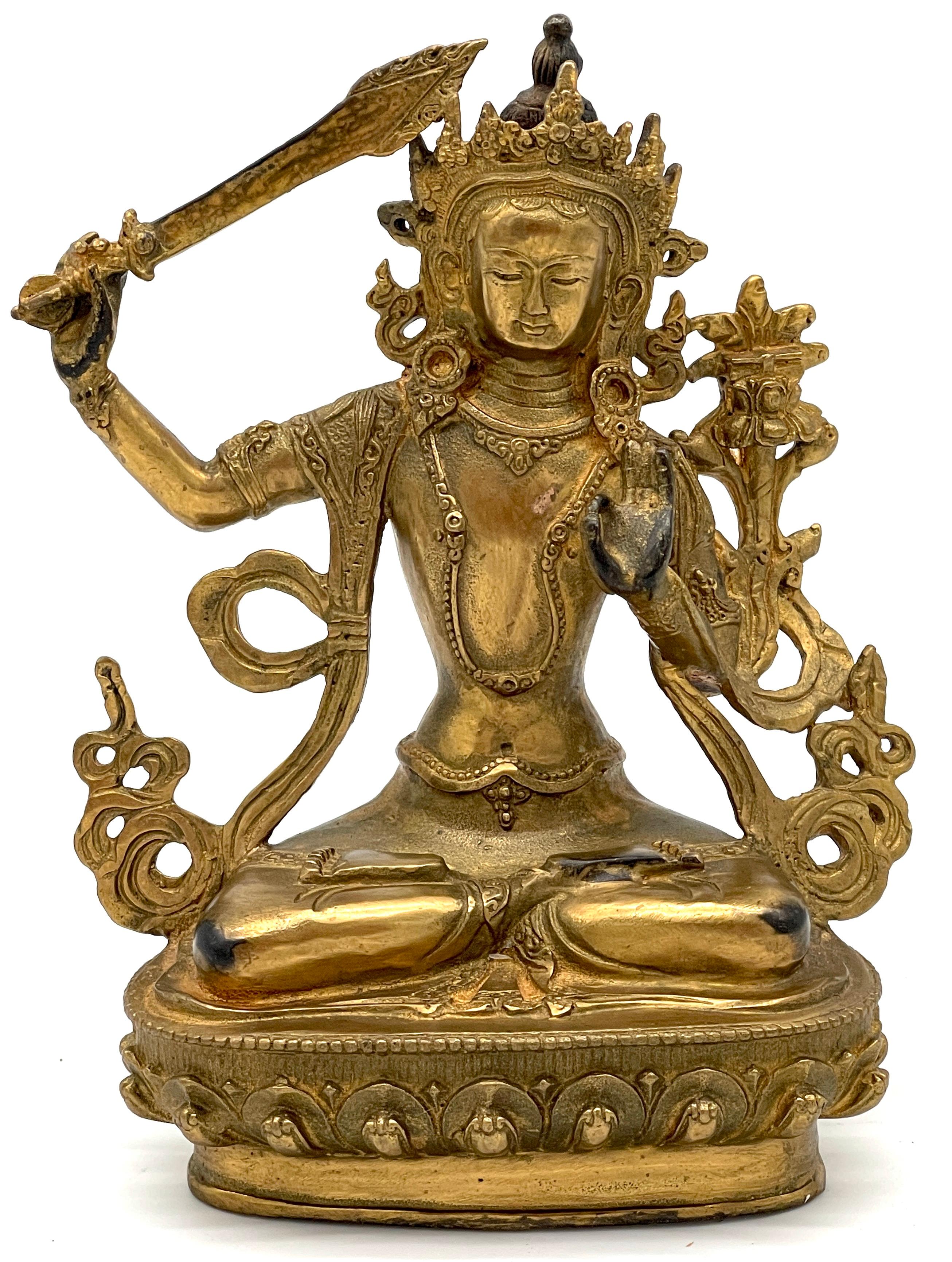 19th Century Tibetan Gilt Bronze figure of the Manjushri Bodhisattva

An exquisite 19th Century Tibetan gilt bronze sculpture depicting the Manjushri Bodhisattva, the embodiment of Wisdom in Buddhist tradition. This well-executed artwork shows the