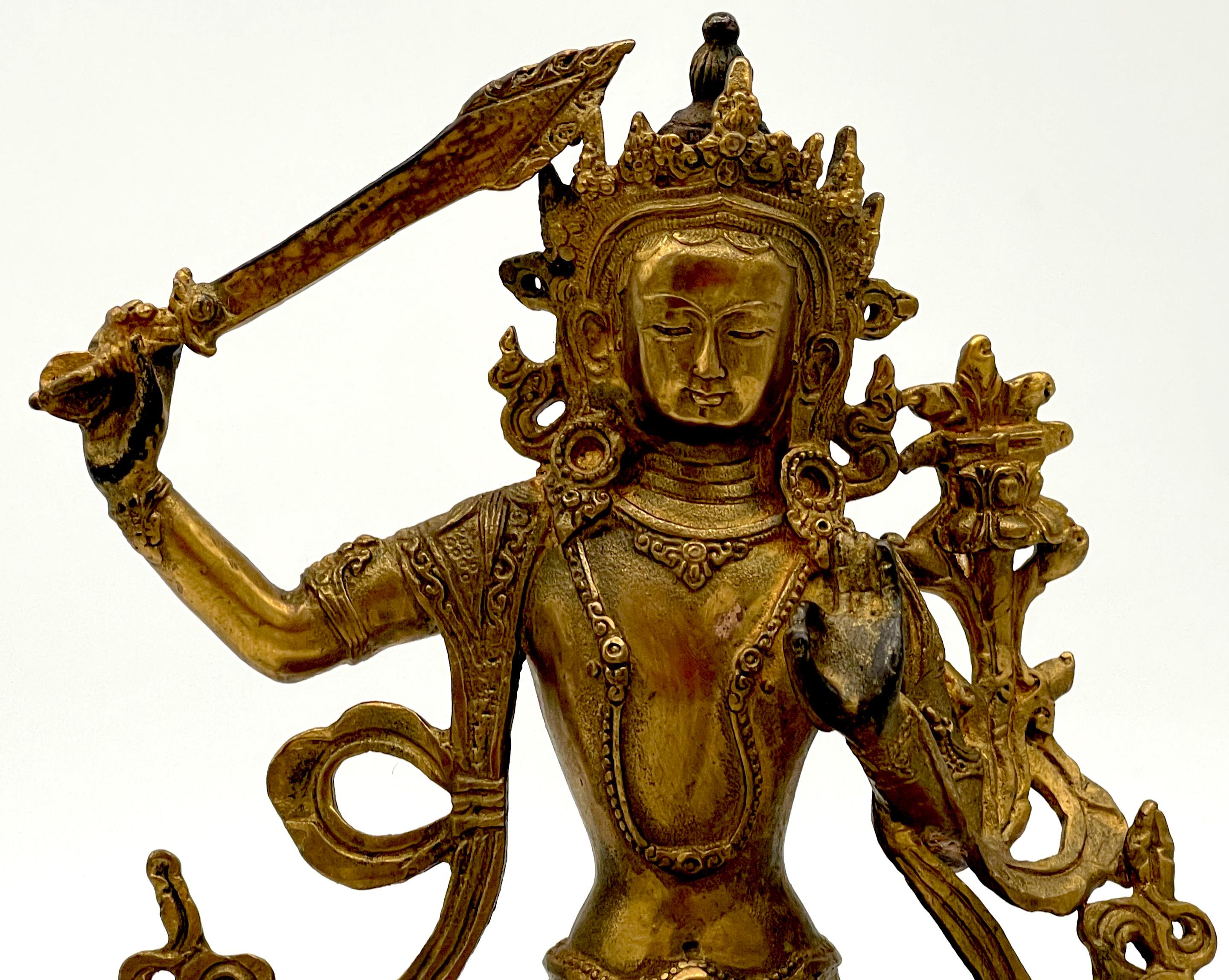 19th Century Tibetan Gilt Bronze figure of the Manjushri Bodhisattva In Good Condition For Sale In West Palm Beach, FL