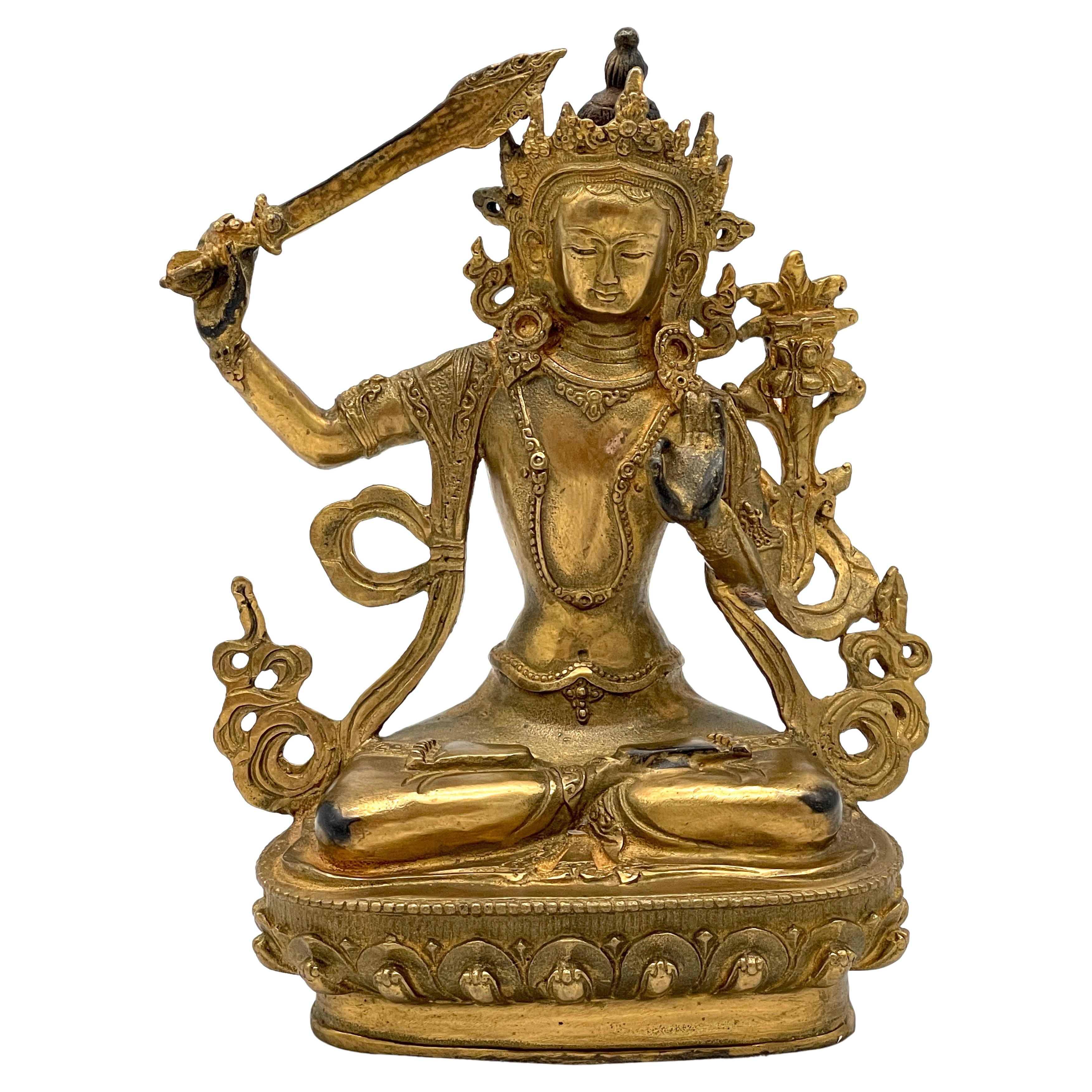 19th Century Tibetan Gilt Bronze figure of the Manjushri Bodhisattva For Sale